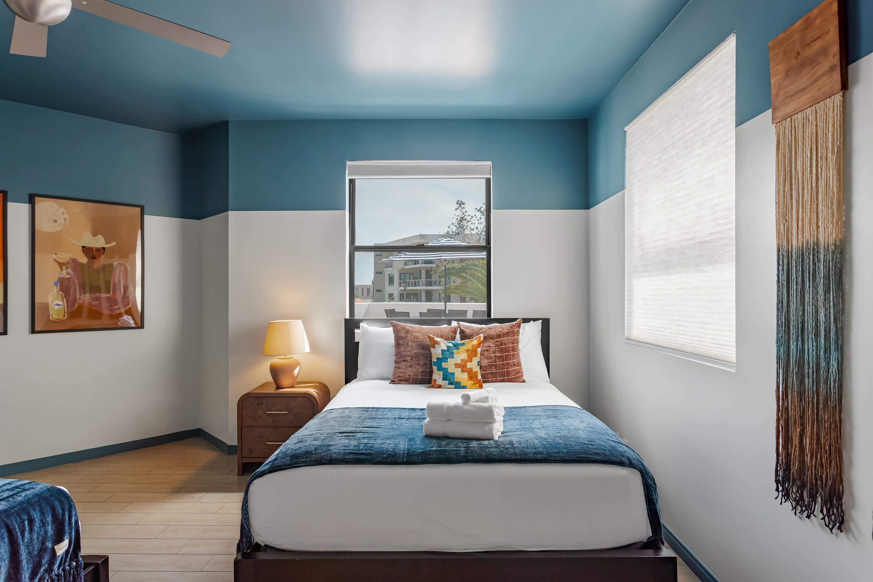 Second bedroom featuring two Queen beds, direct access to the Jack-and-Jill bathroom, and a spacious layout designed for a comfortable and restful stay.