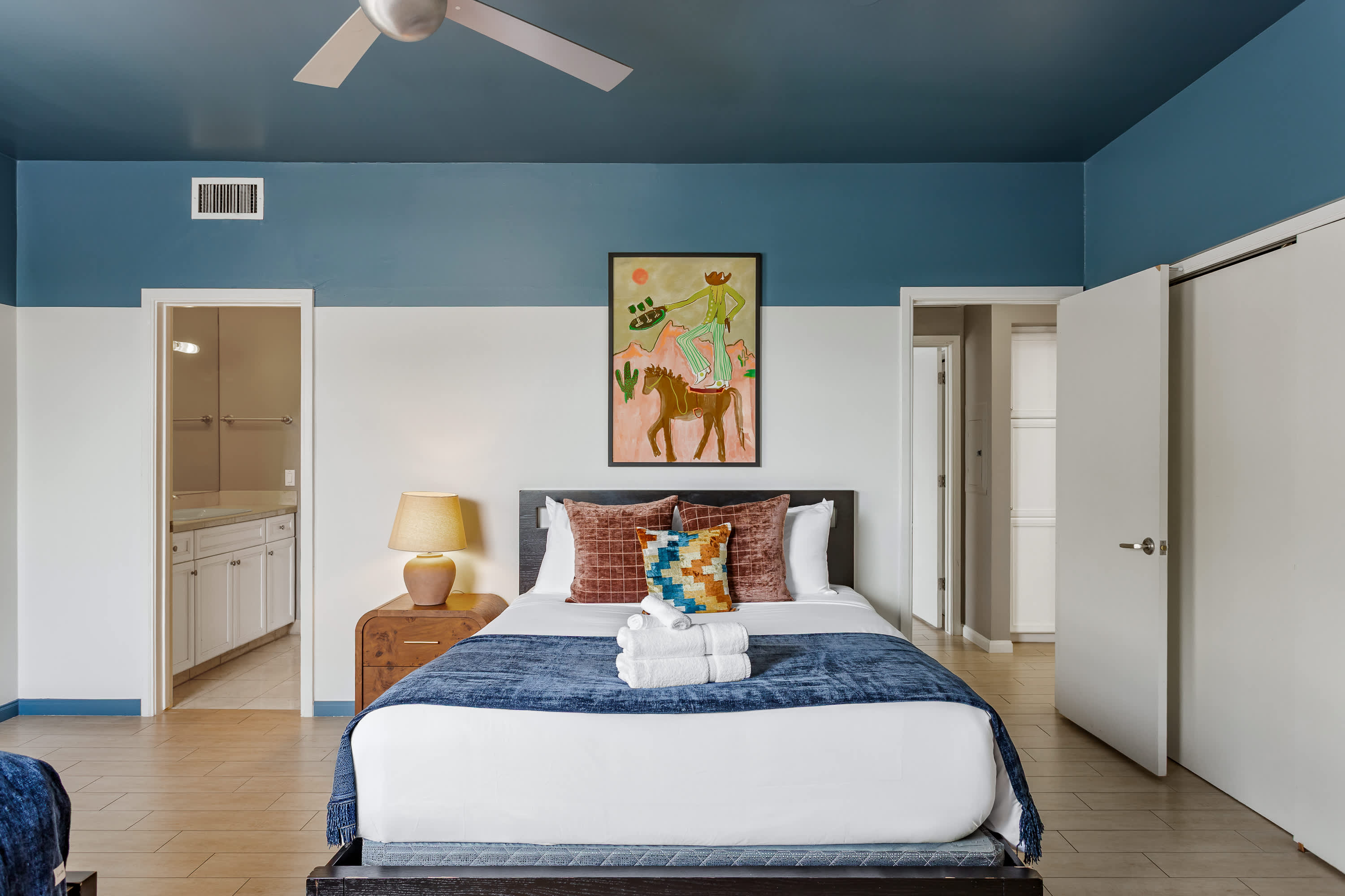 Second bedroom featuring two Queen beds, direct access to the Jack-and-Jill bathroom, and a spacious layout designed for a comfortable and restful stay.