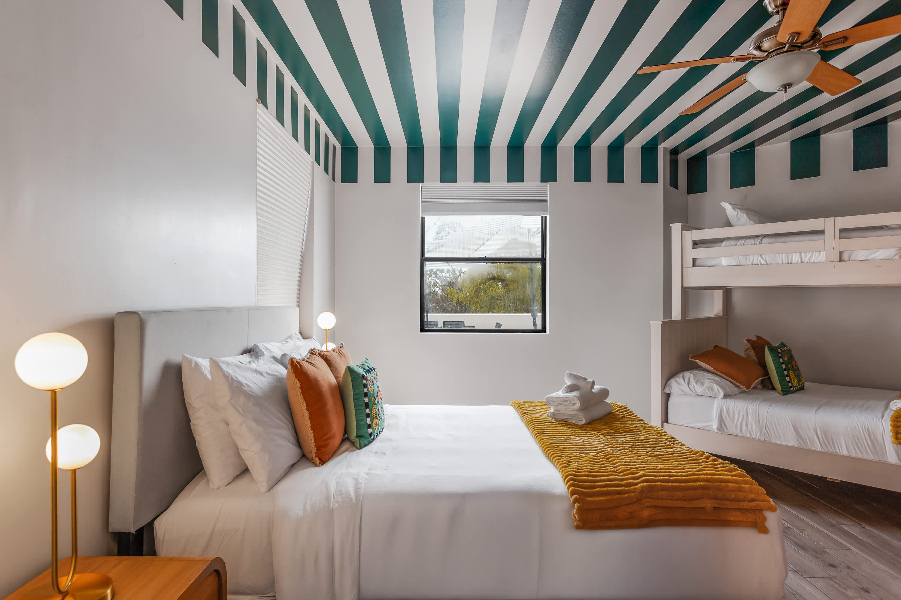 Third bedroom with a Queen bed and a twin over full bunk, generous space to settle in, and direct access to the Jack-and-Jill bathroom.