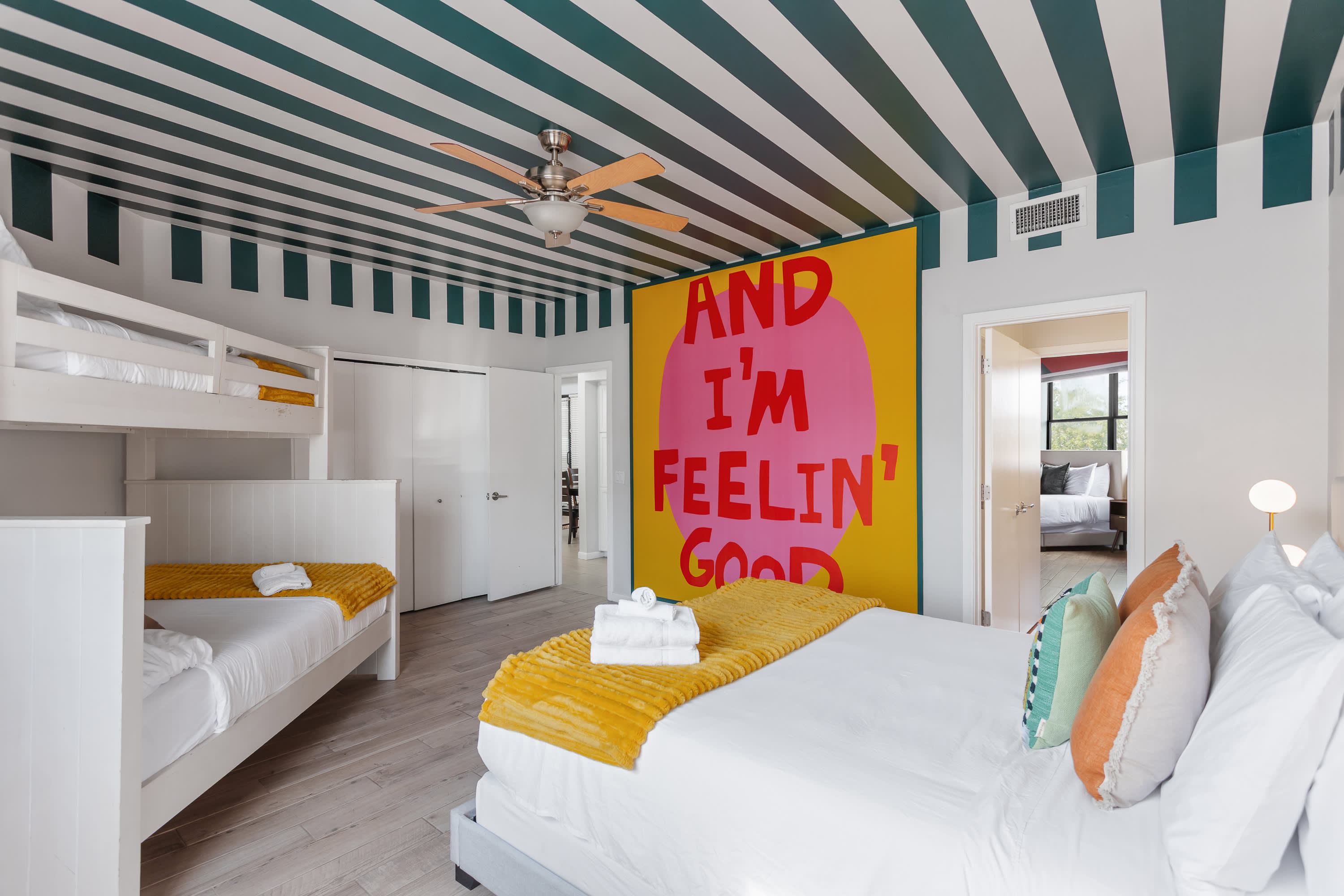 Third bedroom with a Queen bed and a twin over full bunk, generous space to settle in, and direct access to the Jack-and-Jill bathroom.