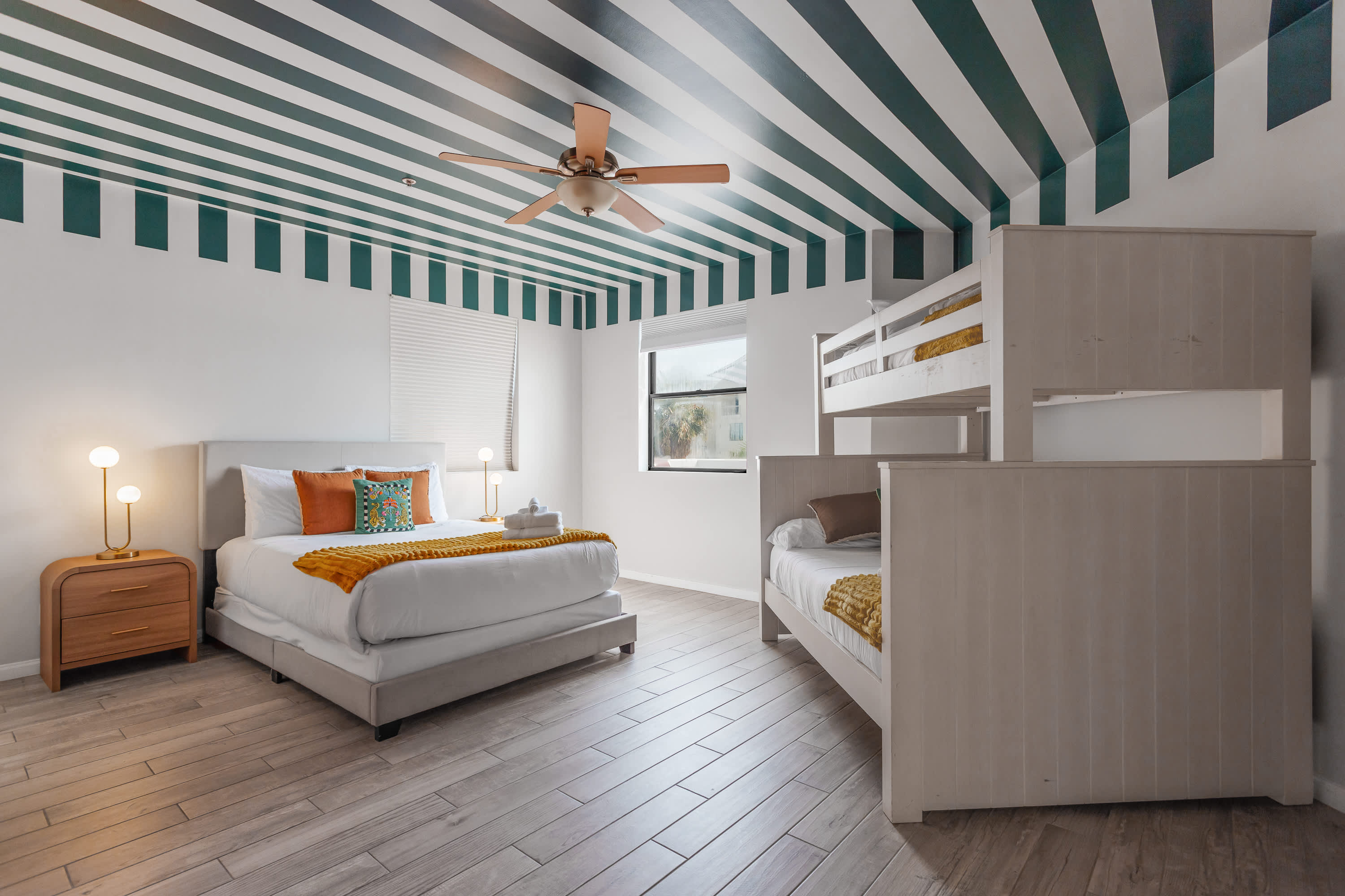 Third bedroom with a Queen bed and a twin over full bunk, generous space to settle in, and direct access to the Jack-and-Jill bathroom.