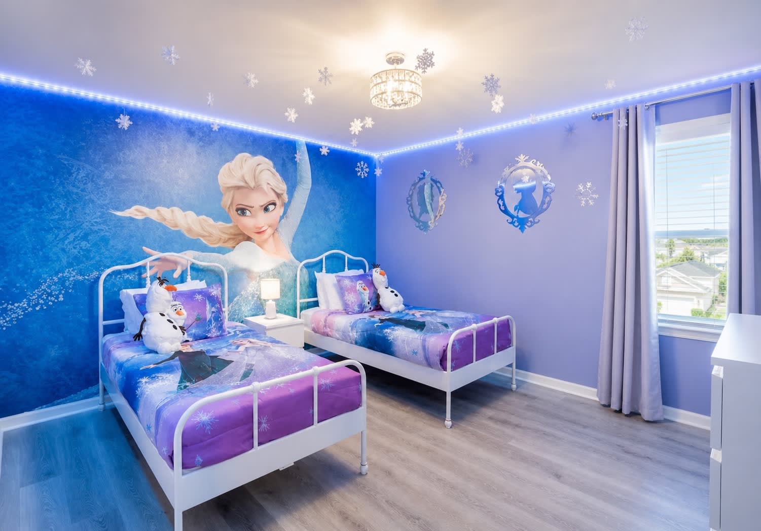 Dreams as magical as Arendelle in bedroom 3 with 2 twin beds, crib, and Smart TV