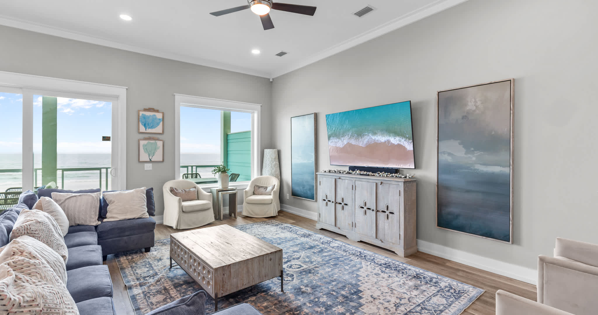 Unwind in the coastal chic living room & stream your favorites on the smart TV​