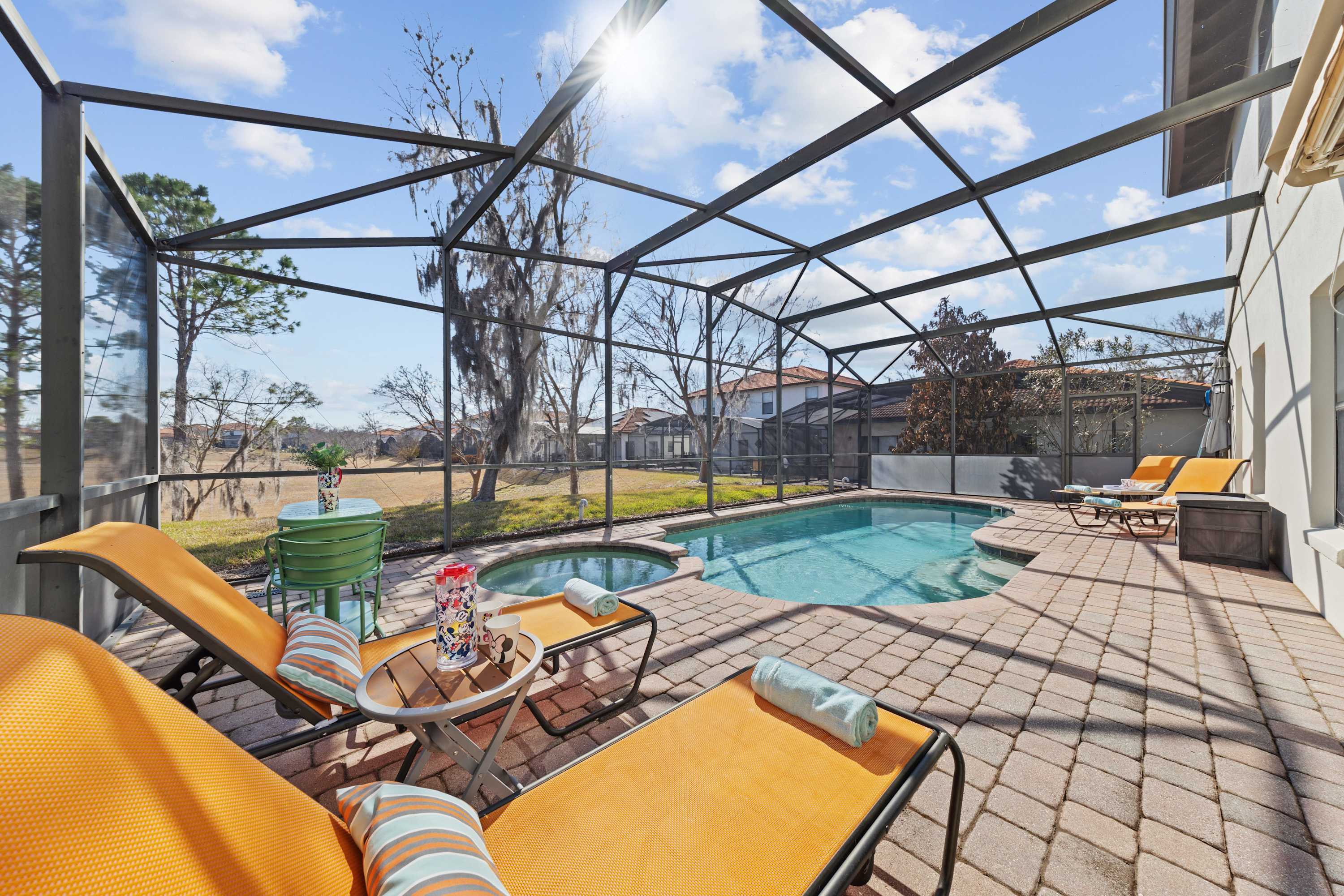 Soak up the sun with a refreshing drink by the pool