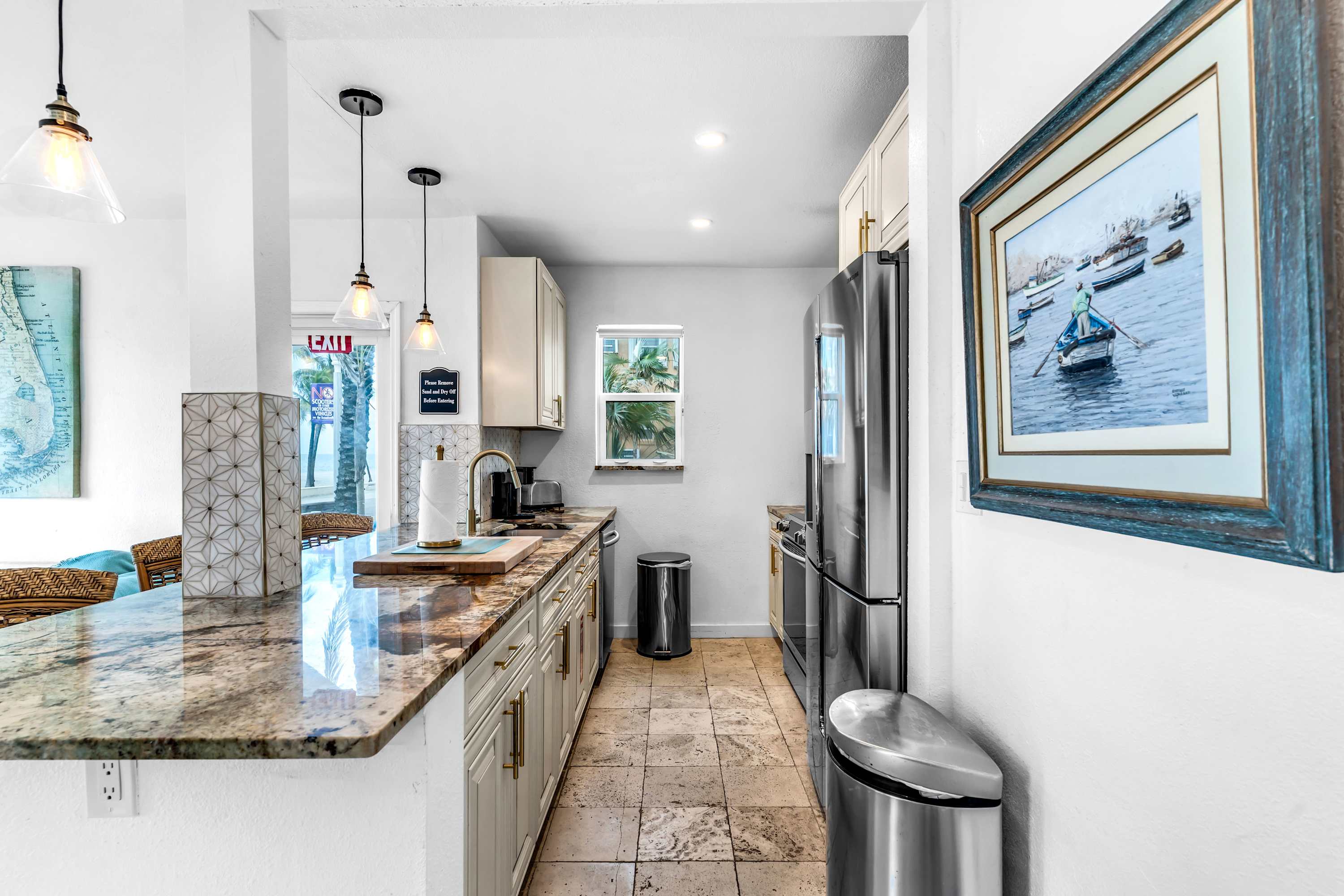 The open kitchen is well equipped for an unforgettable getaway​