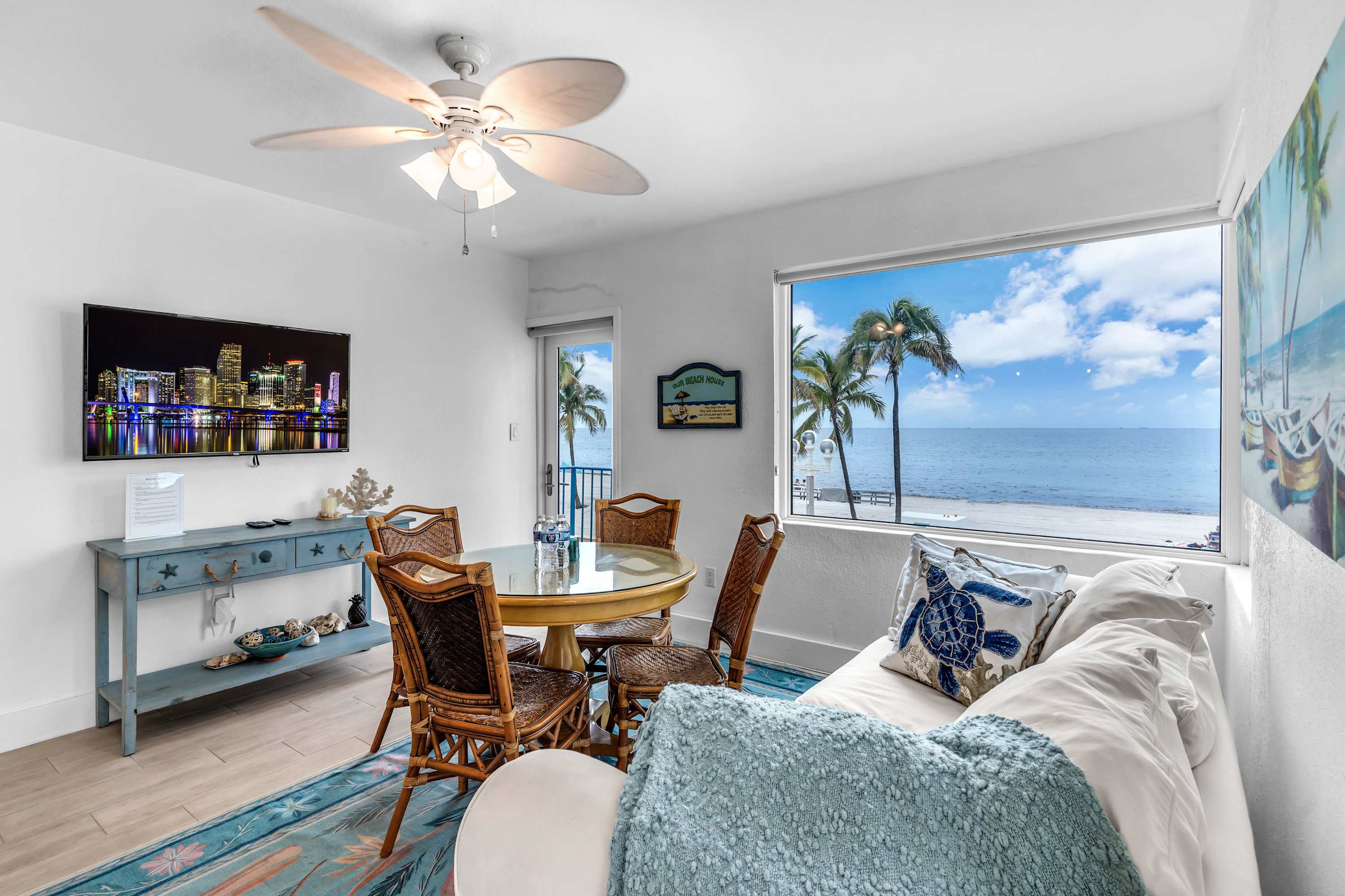 Unwind in the oceanview living room & stream your favorites on the smart TV​