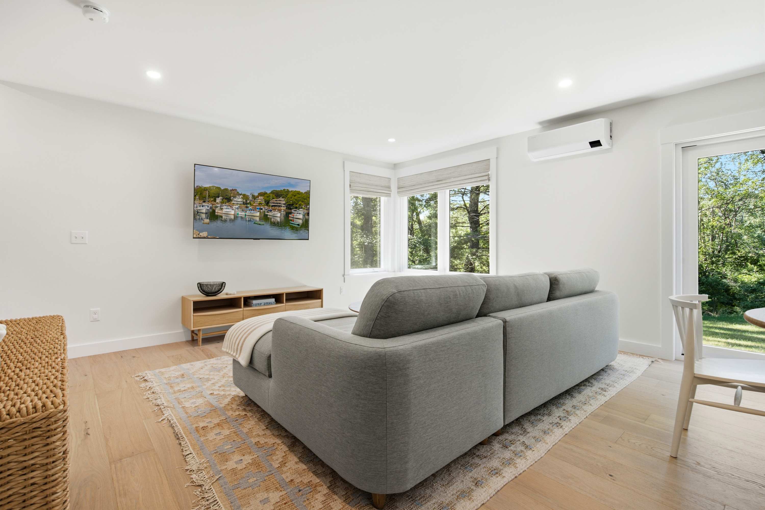 Unwind in the serene living room & stream your favorites on the smart TV​