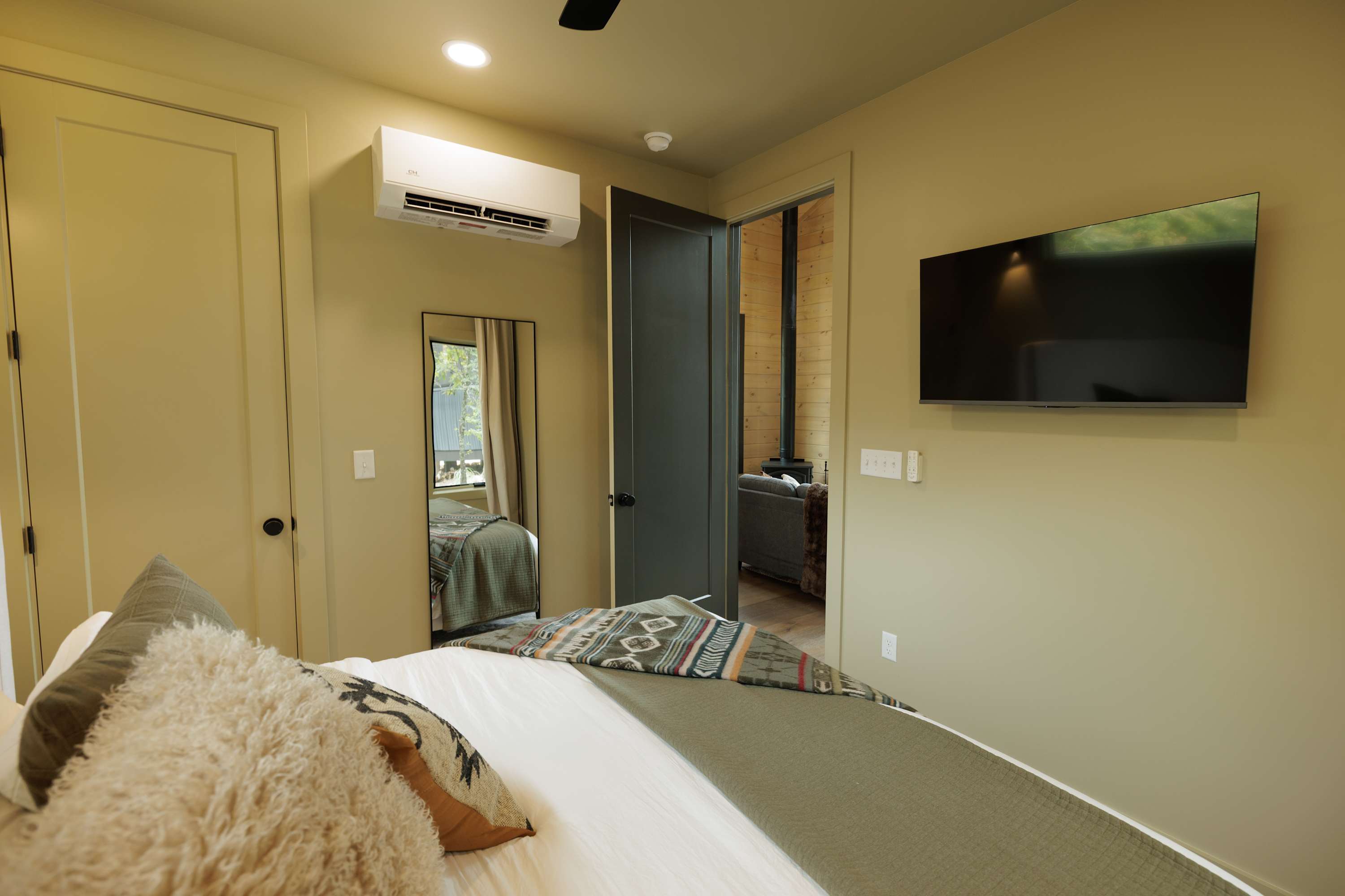 Bedroom is ready for a cozy and comfortable night’s rest.