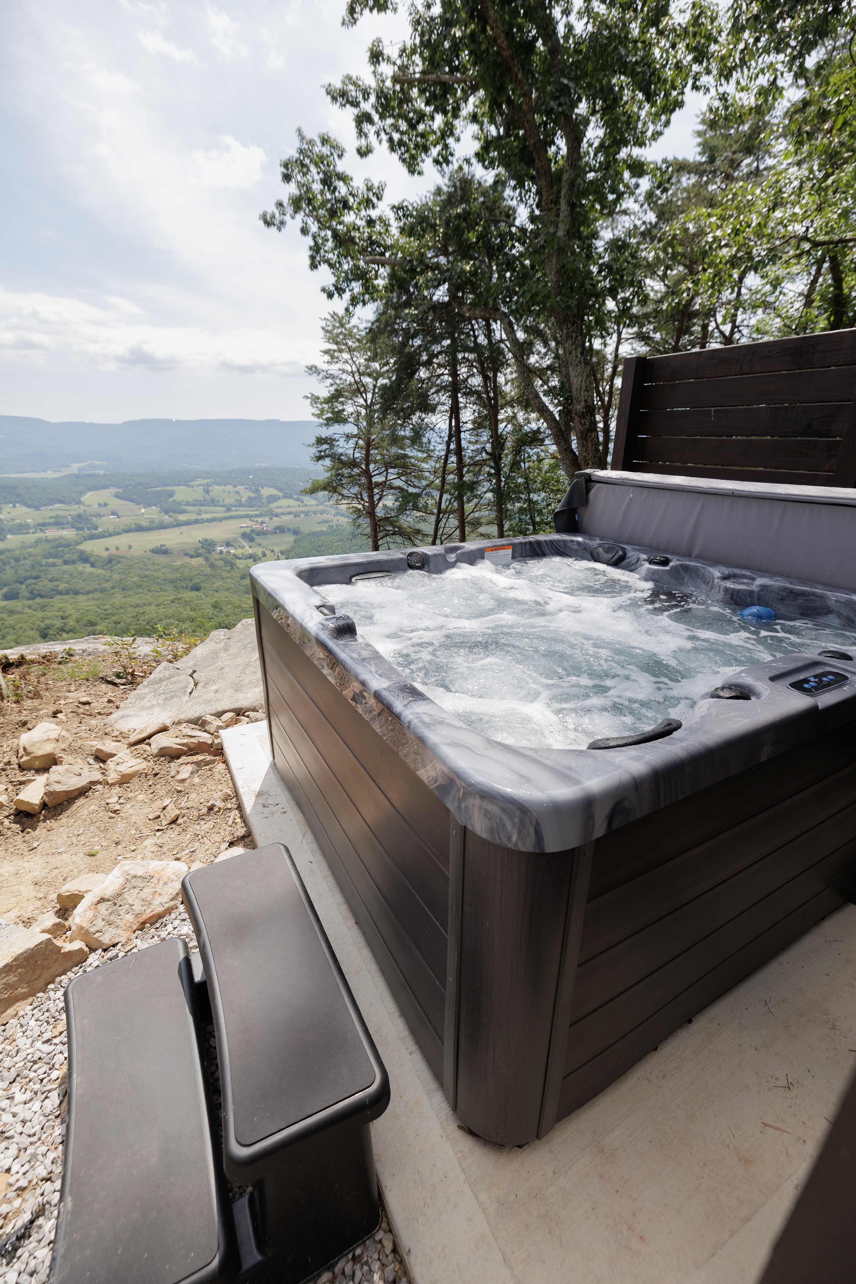 Take in the mountain views from your private hot tub.