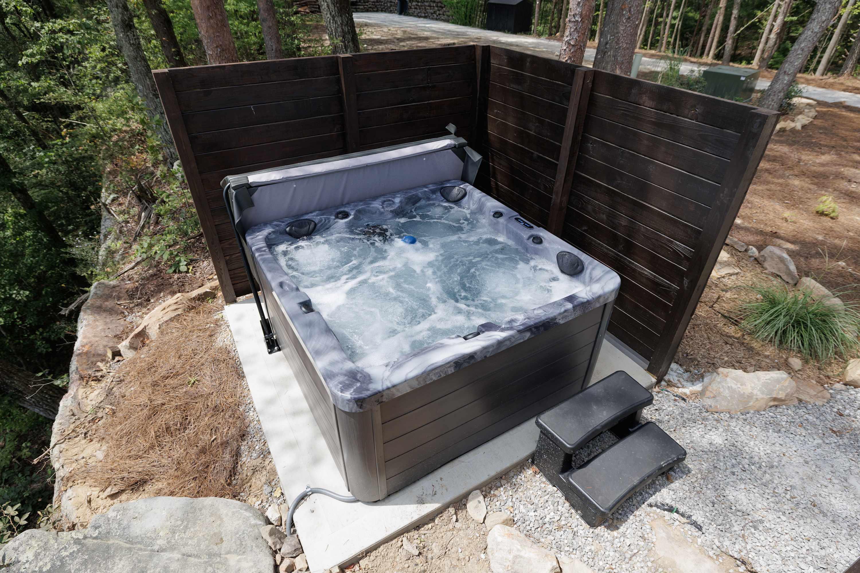A different view of the relaxing outdoor hot tub.