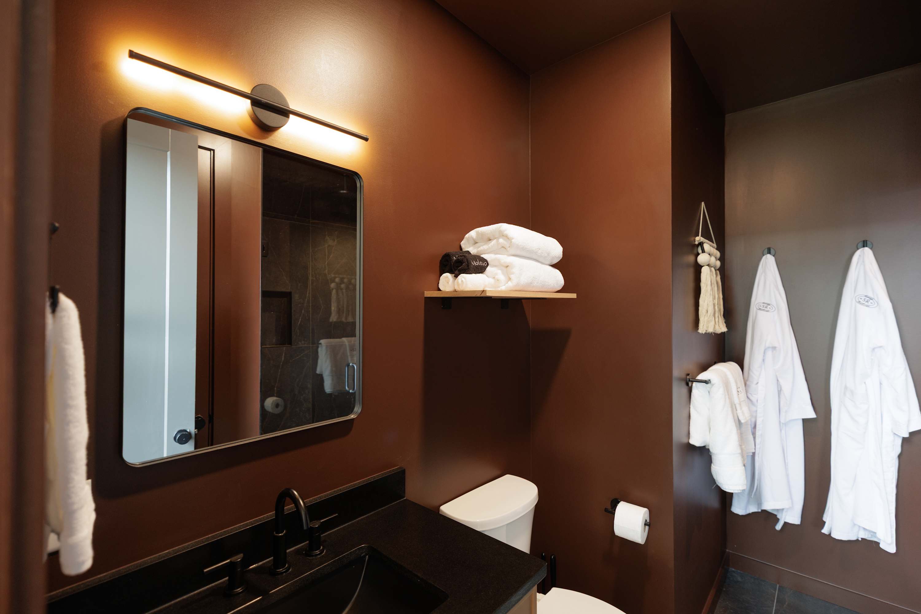 Fresh linens and cozy robes for your comfort.