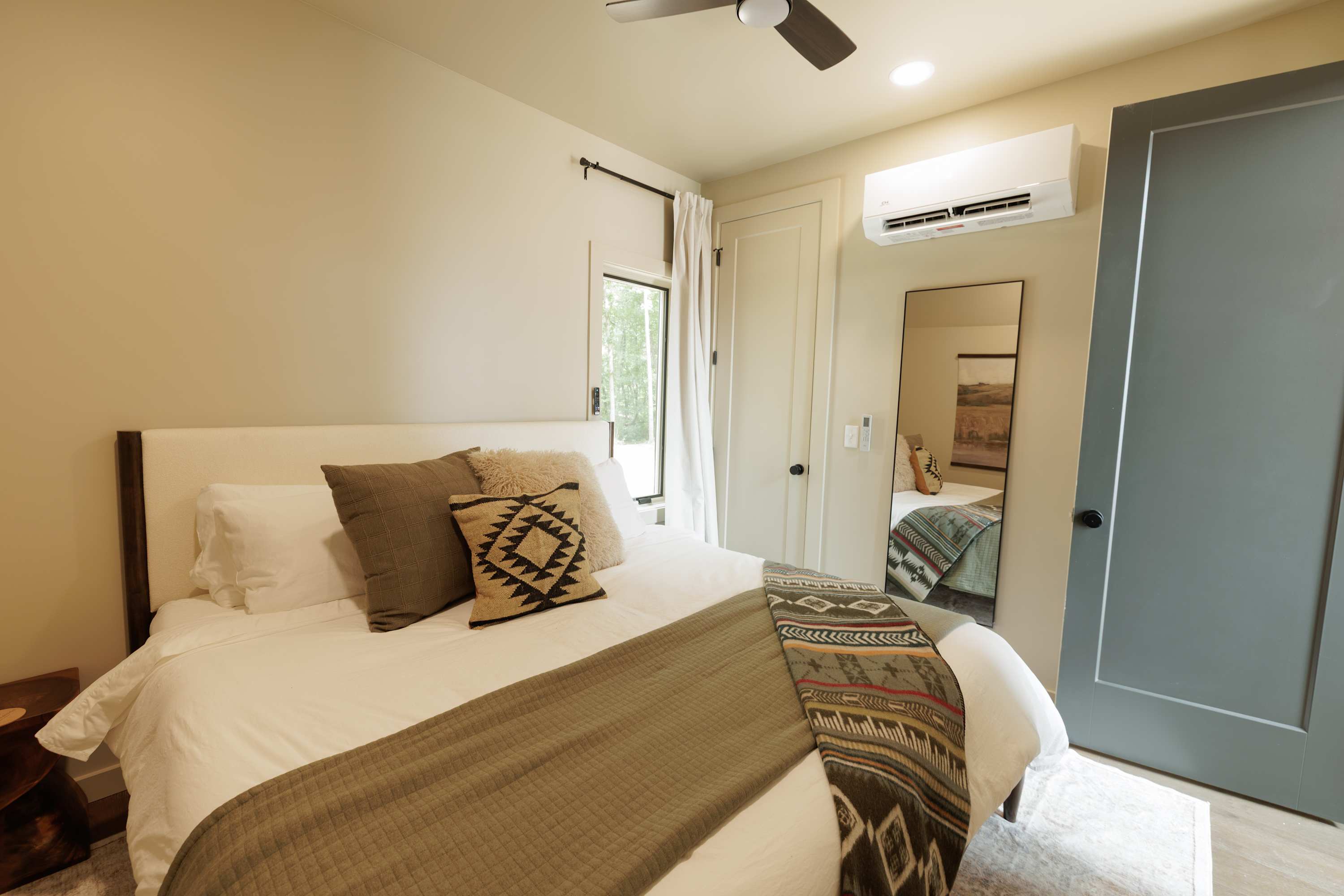 A peaceful bedroom made for a restful stay.