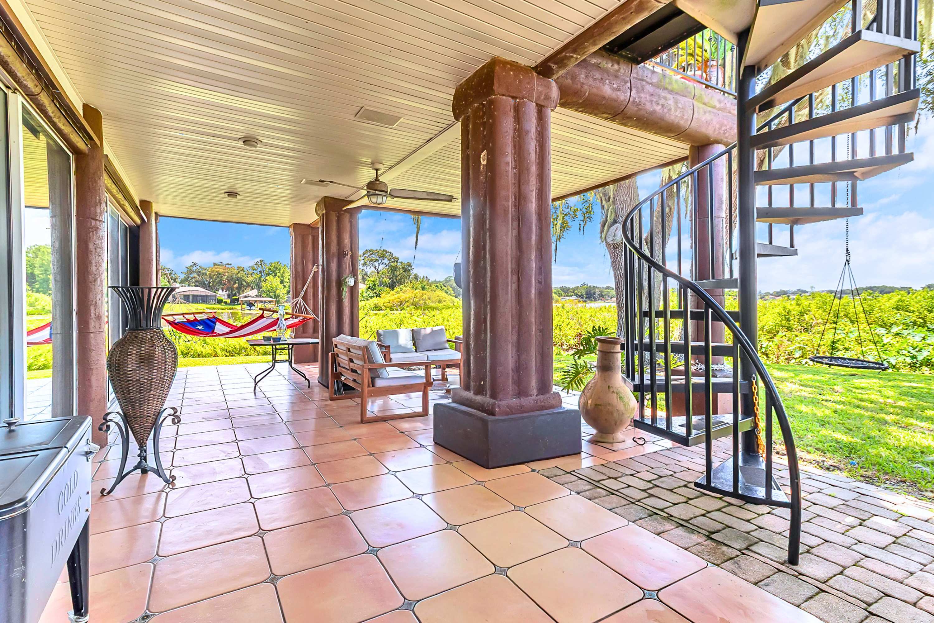 Take the unique spiral staircase up to your 2F room. Steep steps, active guests!