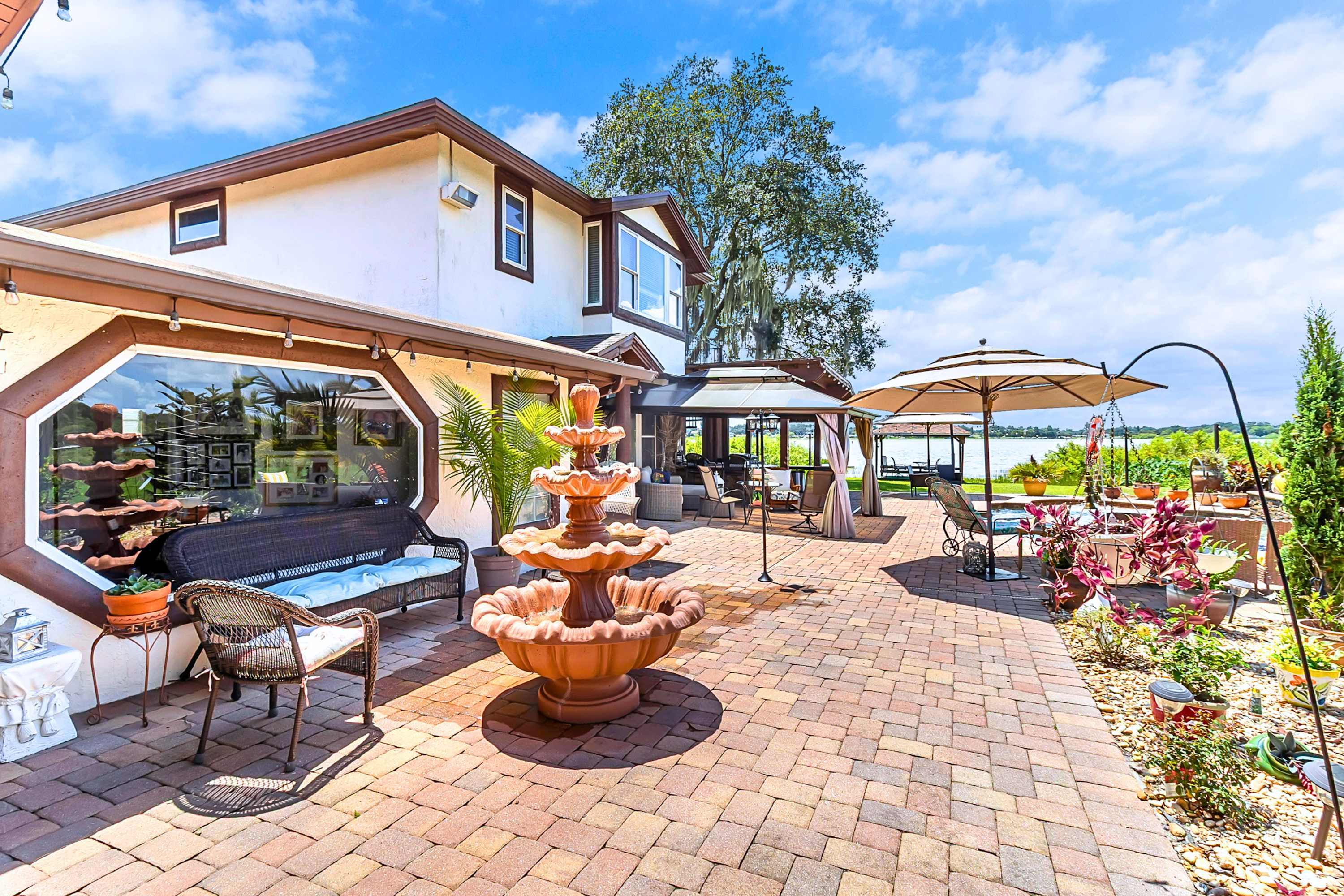 Unwind in the outdoor lounge area and enjoy the calming water fountain views