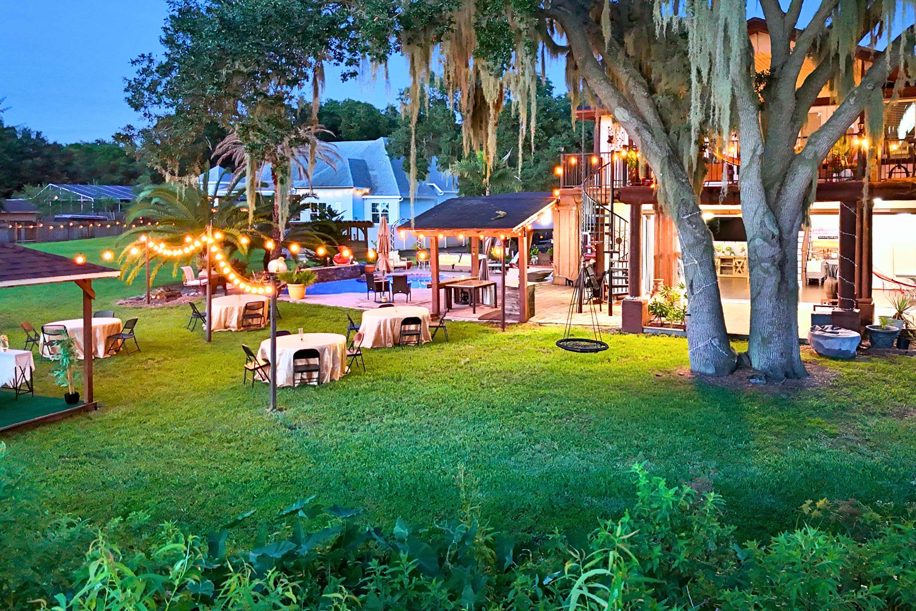 Magical night atmosphere with tables and lights. Available to rent for your private events!