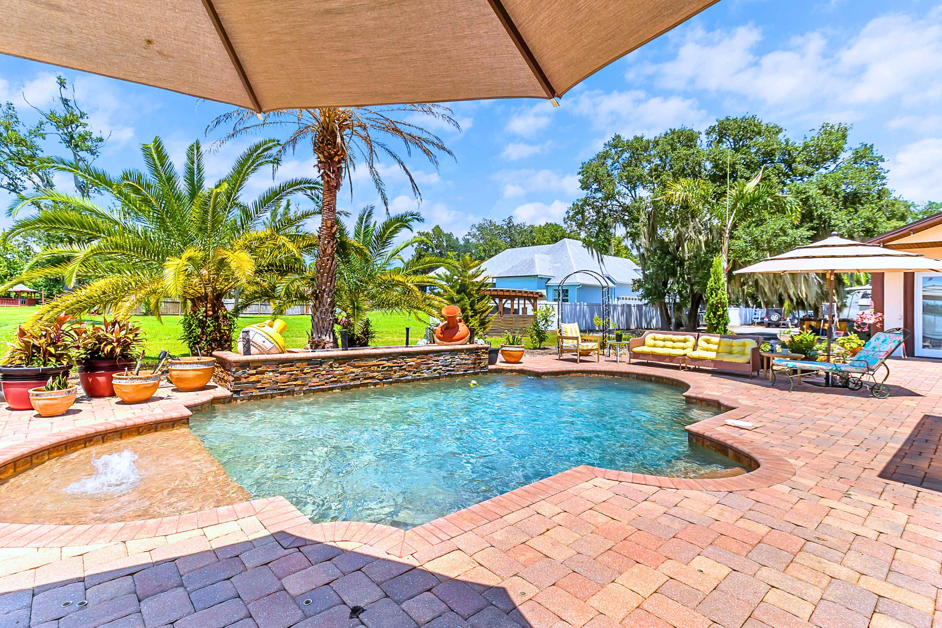 Cool waters, tropical vibes, and total poolside comfort for your ultimate vacation stay