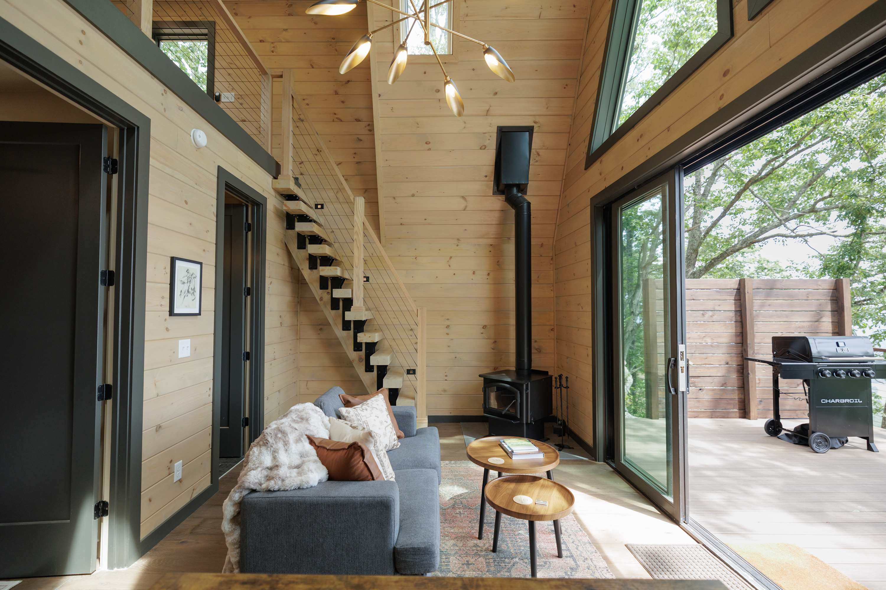 Sunlit Living Area with High Ceilings & Large Windows
