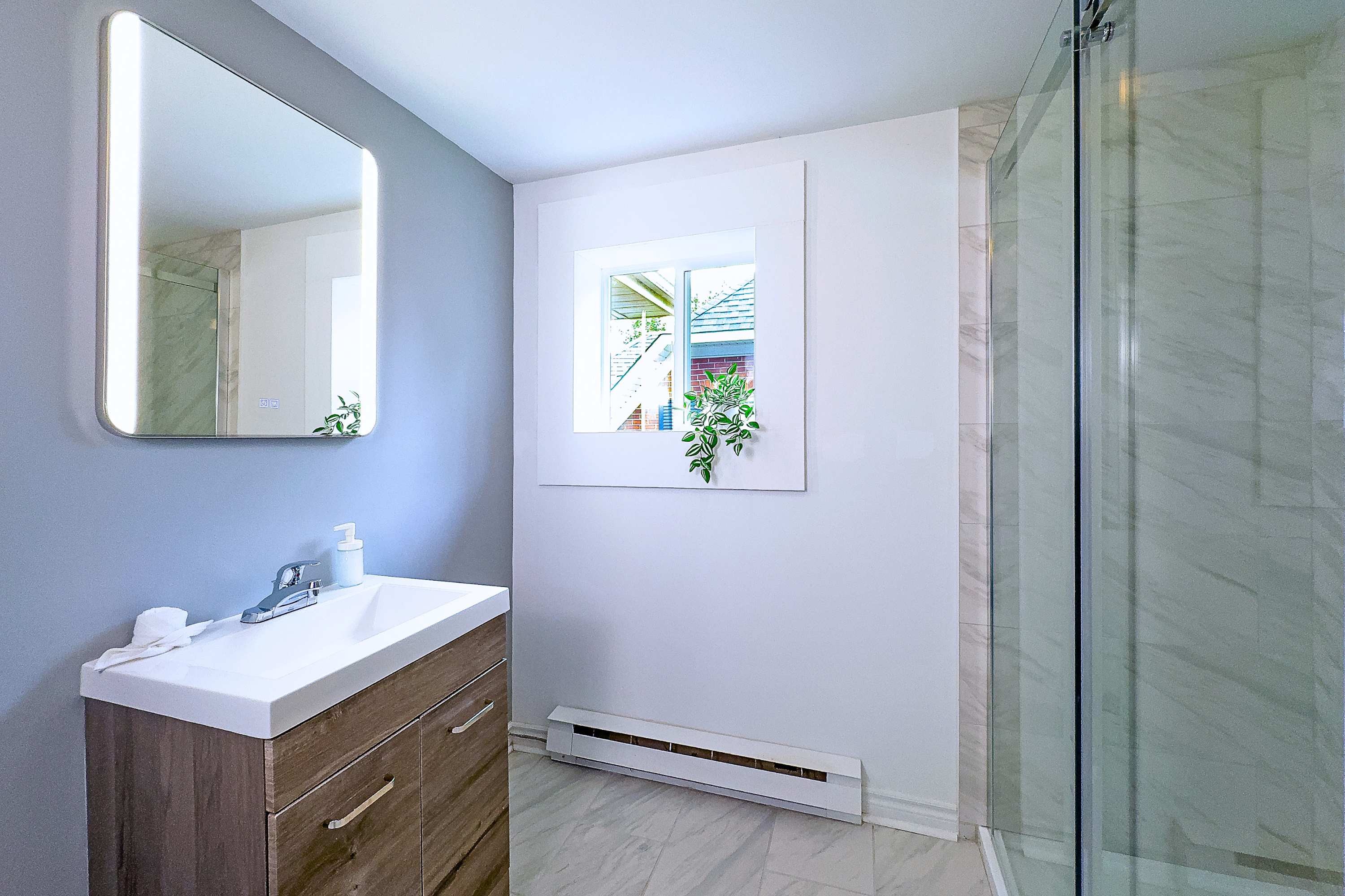 Large standing shower in the modern bathroom