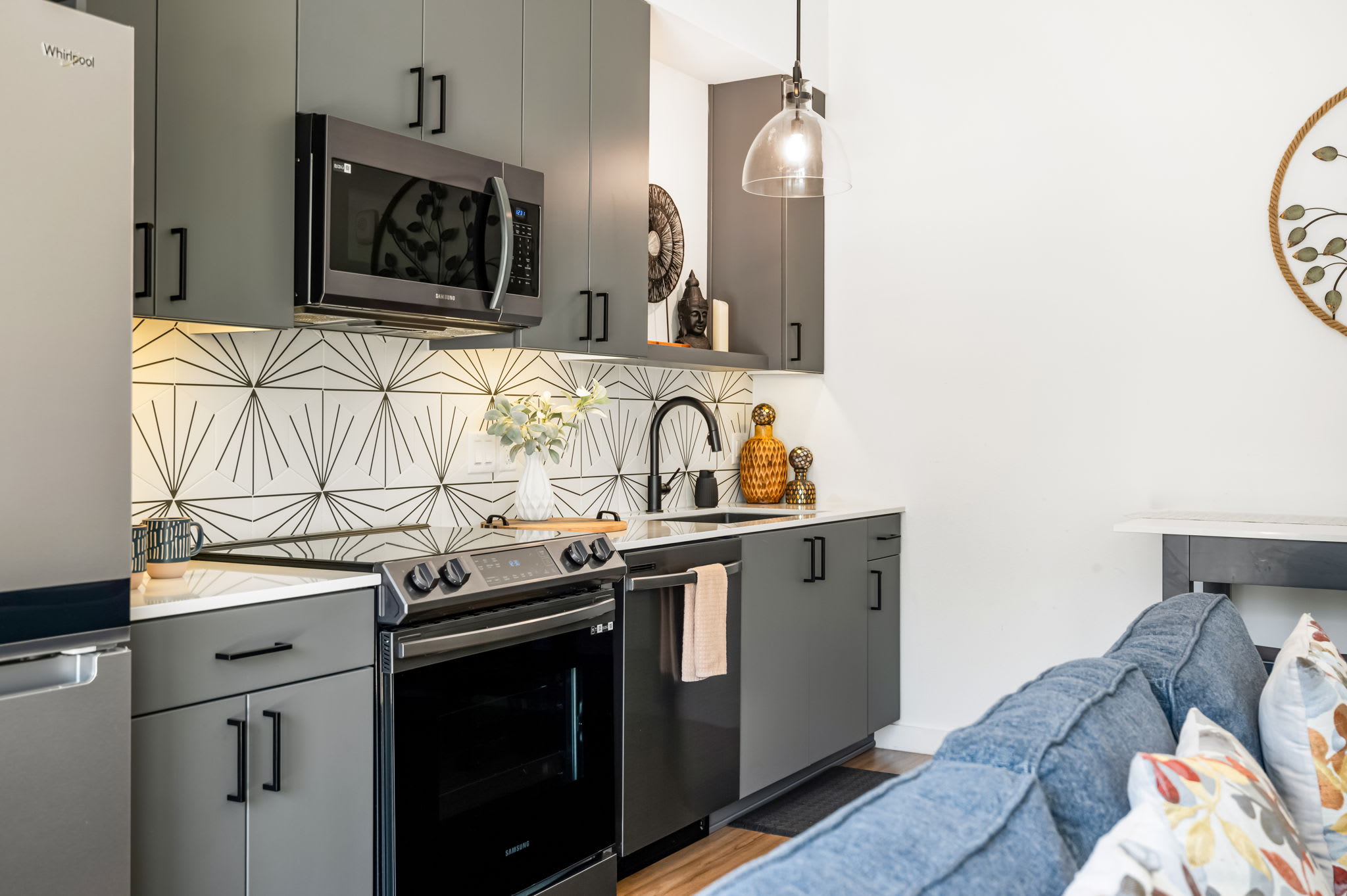 Kitchen with patterned tile backsplash