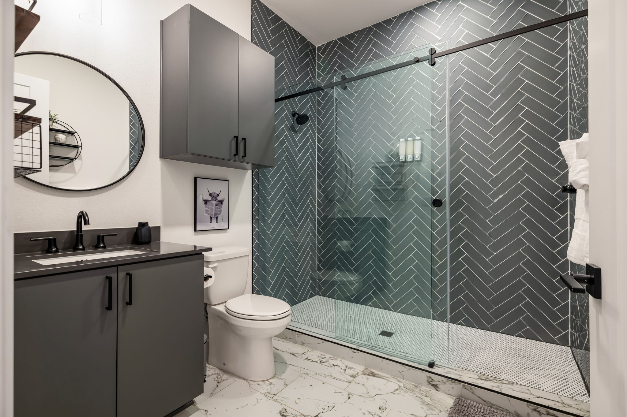 Bathroom with herringbone tile shower