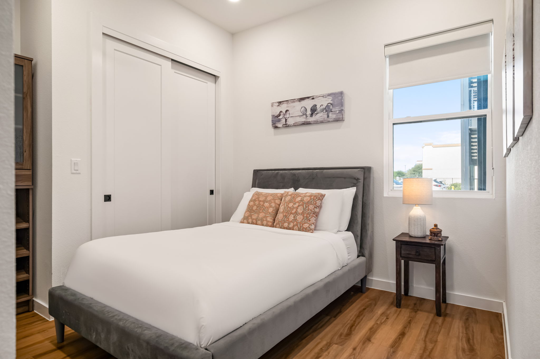 Bedroom with window and bedside table