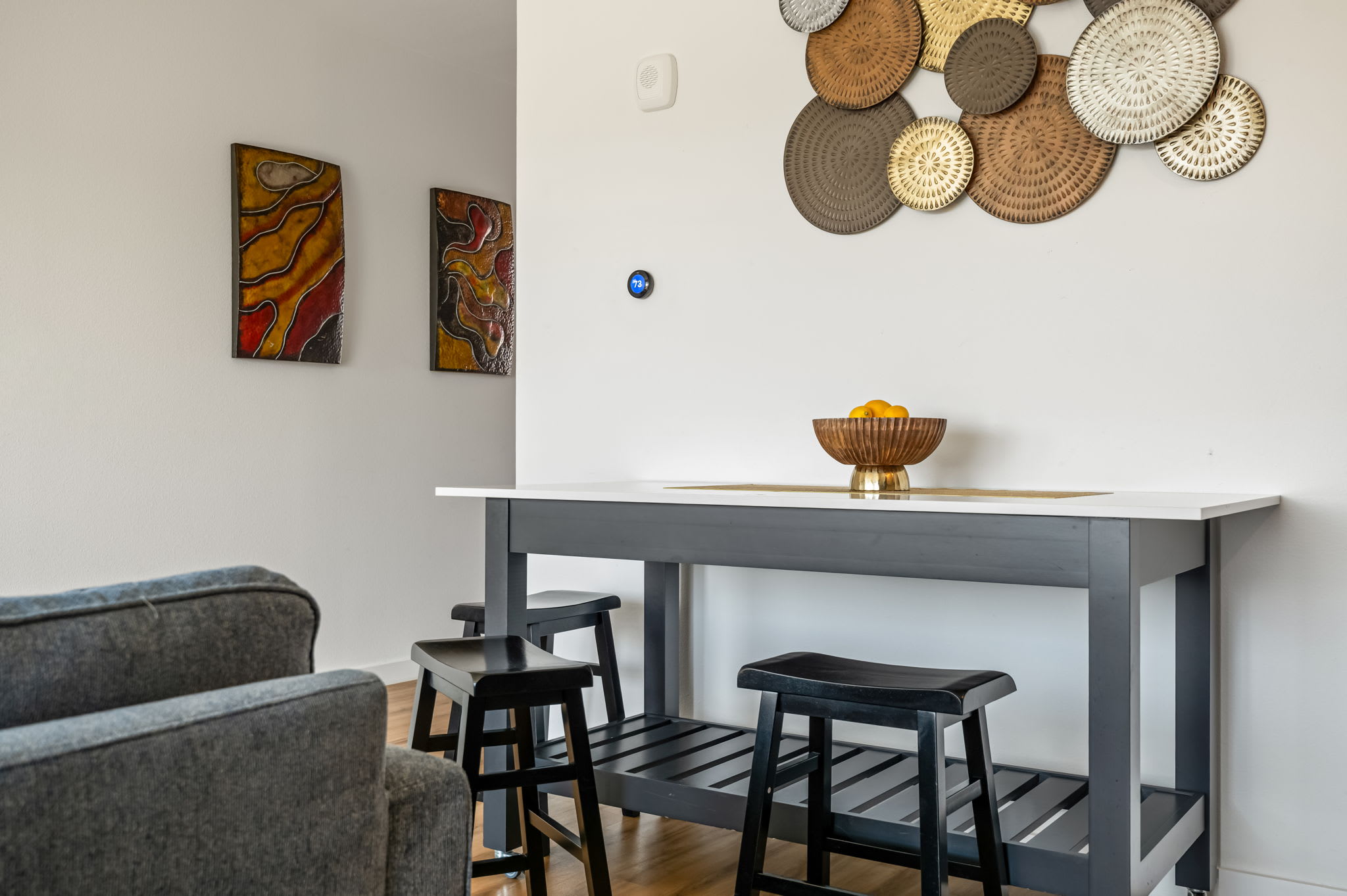 High-top dining table with bar stools