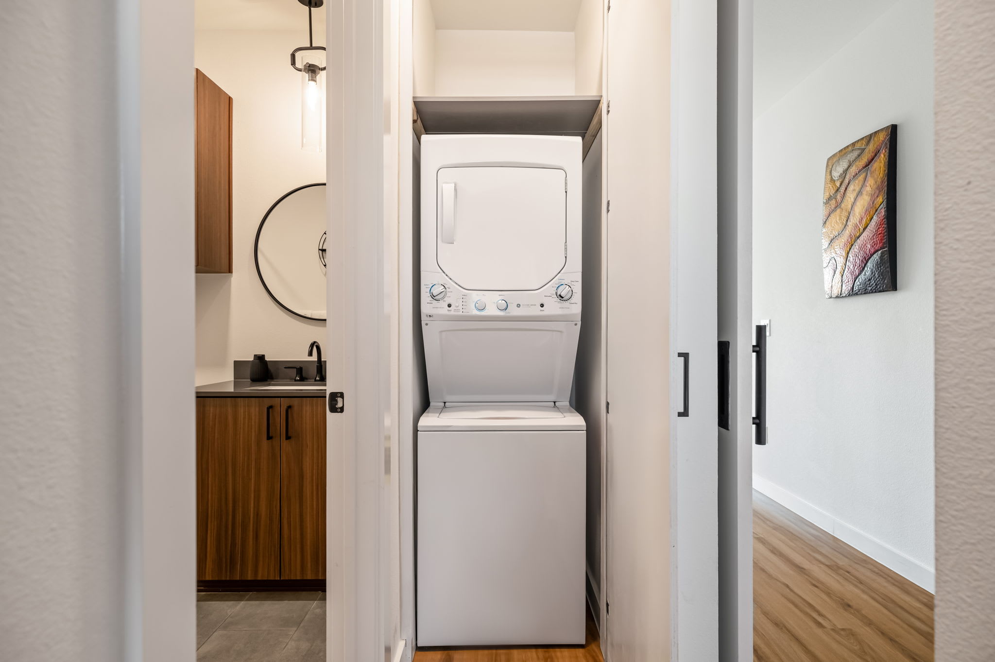 Stacked washer and dryer in the condo