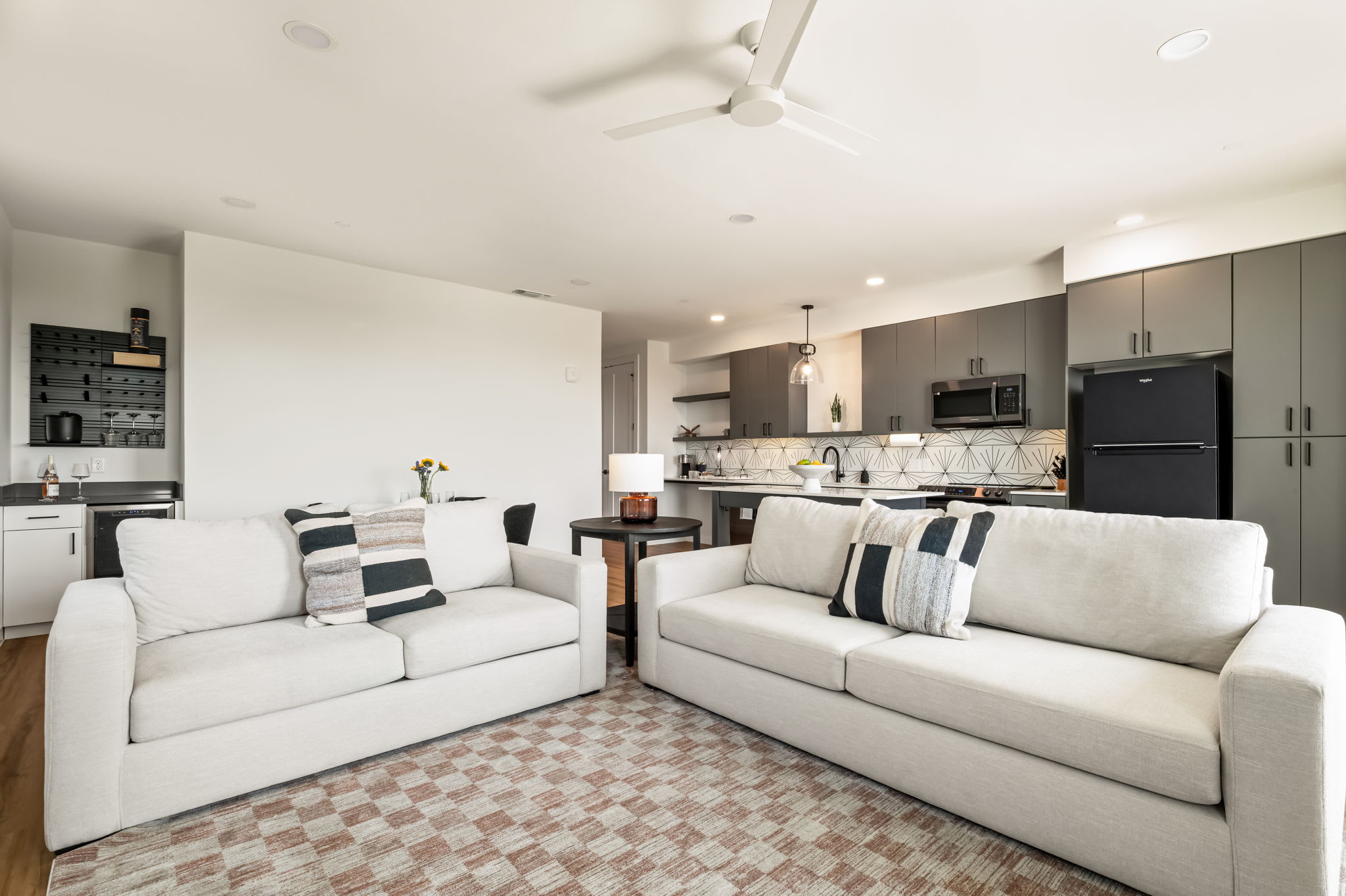Living room with two white sofas