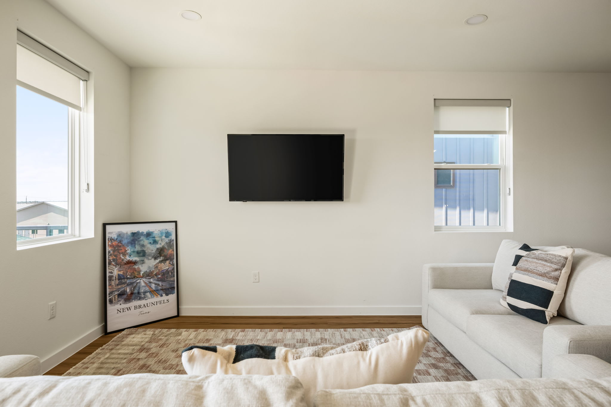 Living area with wall-mounted TV