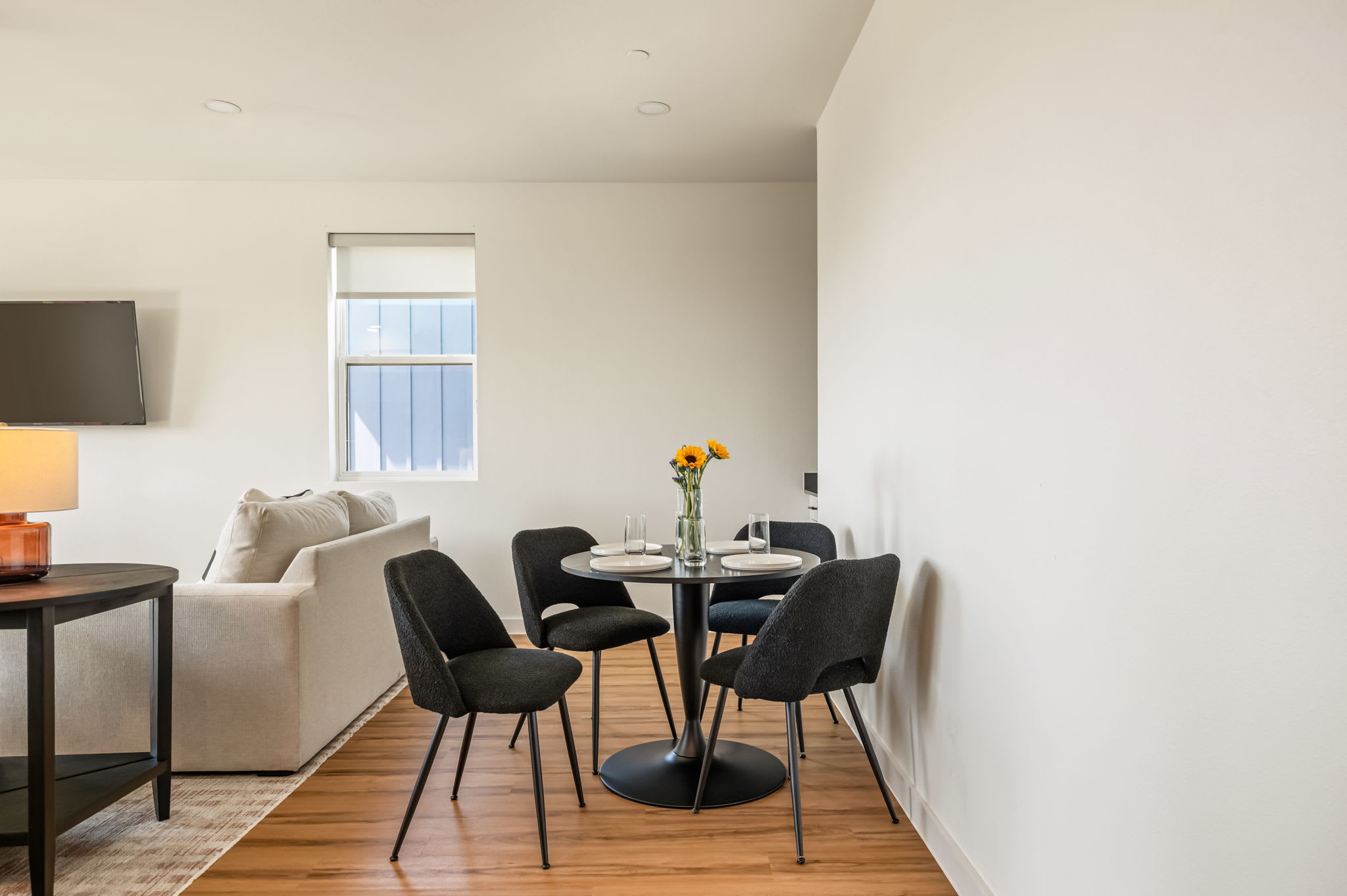 Dining table and chairs by the window