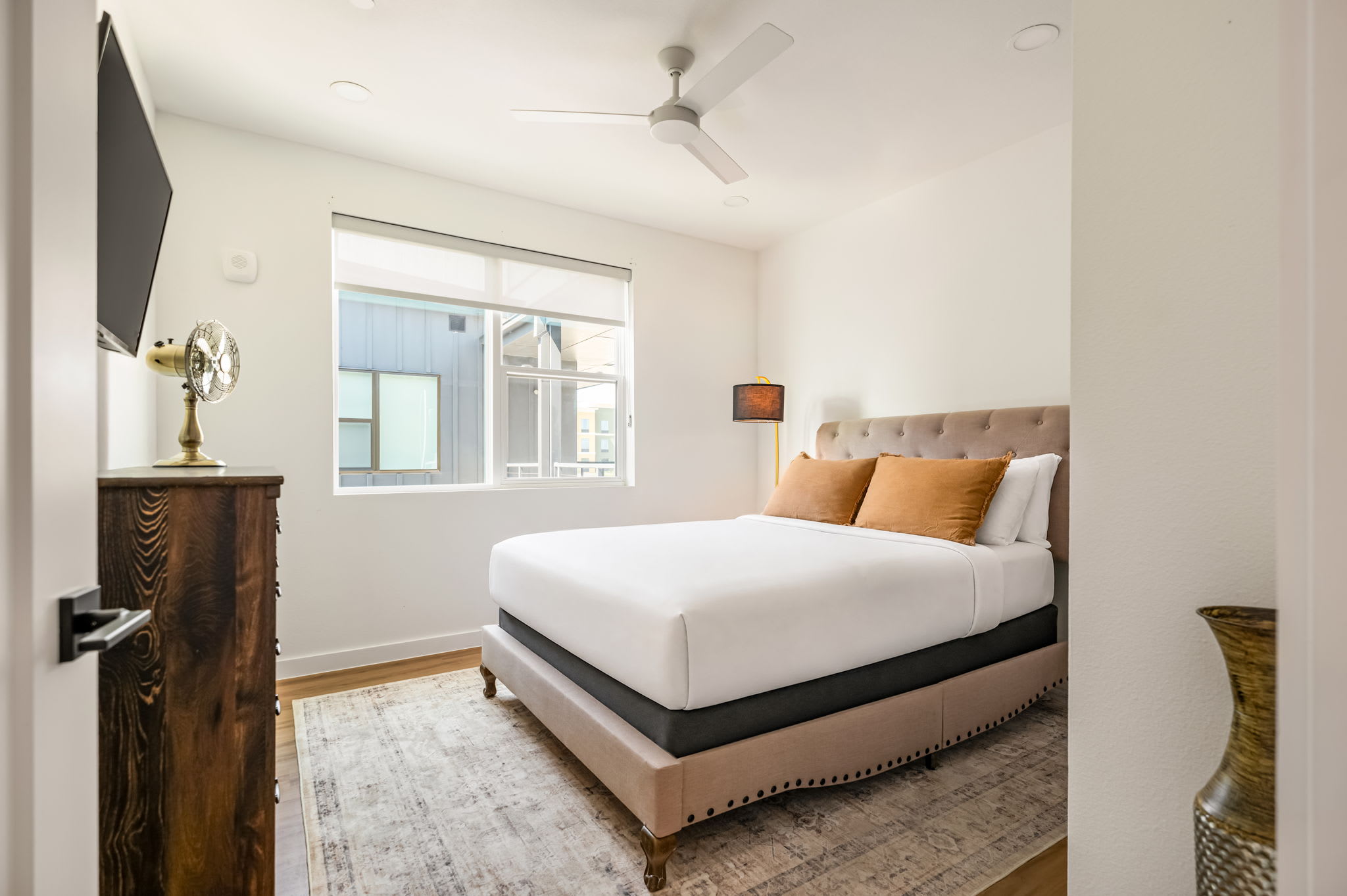 Queen bedroom with smart TV