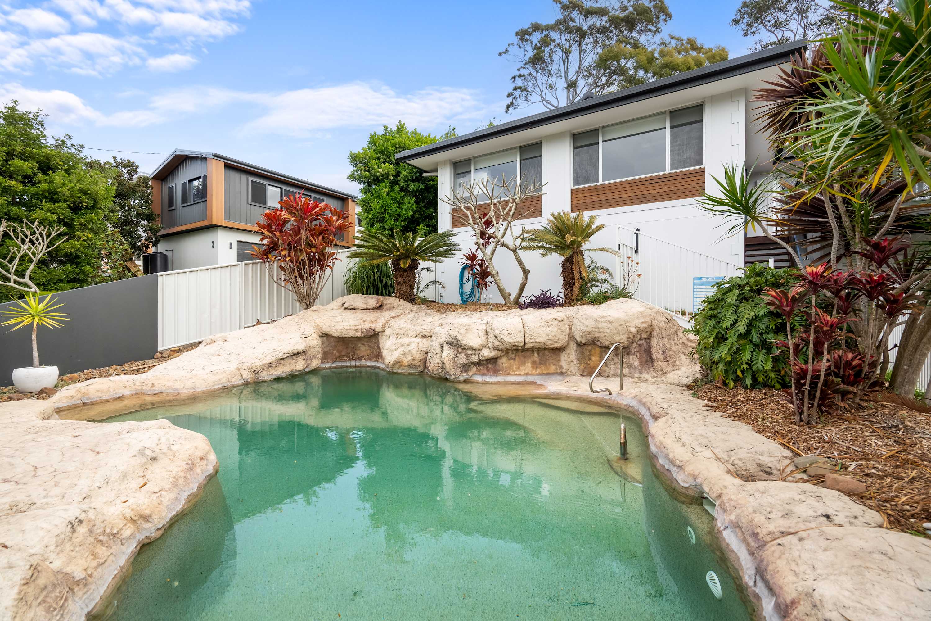 A sparkling pool, a beautiful private garden, a cosy fireplace lounge, and the beach just a short walk away — welcome to Aura. Aura is a beautifully presented three-bedroom, two-bathroom home designed for relaxed coastal living. Comfortable, welcoming, and family-friendly, it’s the perfect place to slow down, spend time together, and enjoy everything Terrigal has to offer.