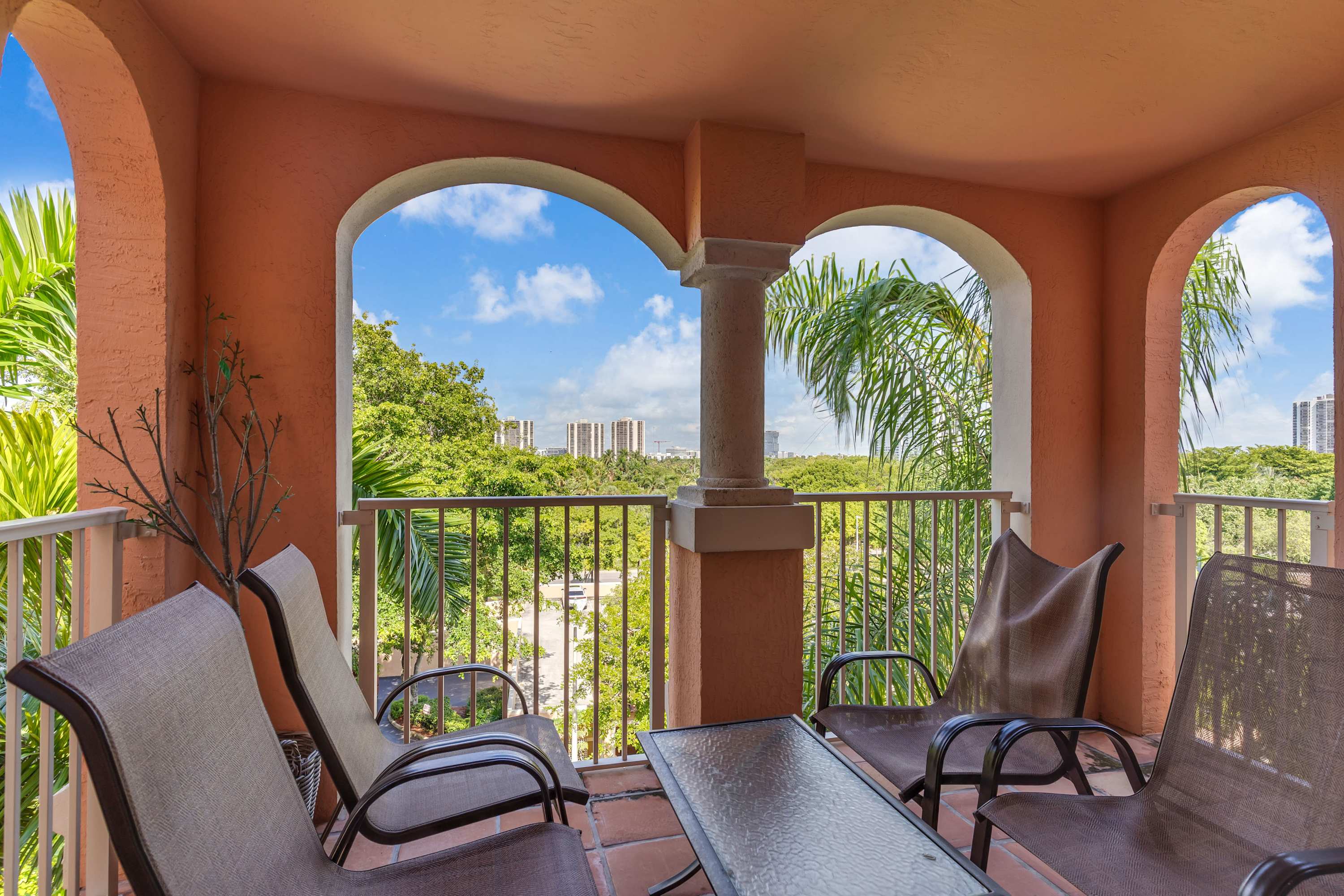 Sip morning coffee or an evening cocktail on the breezy balcony​