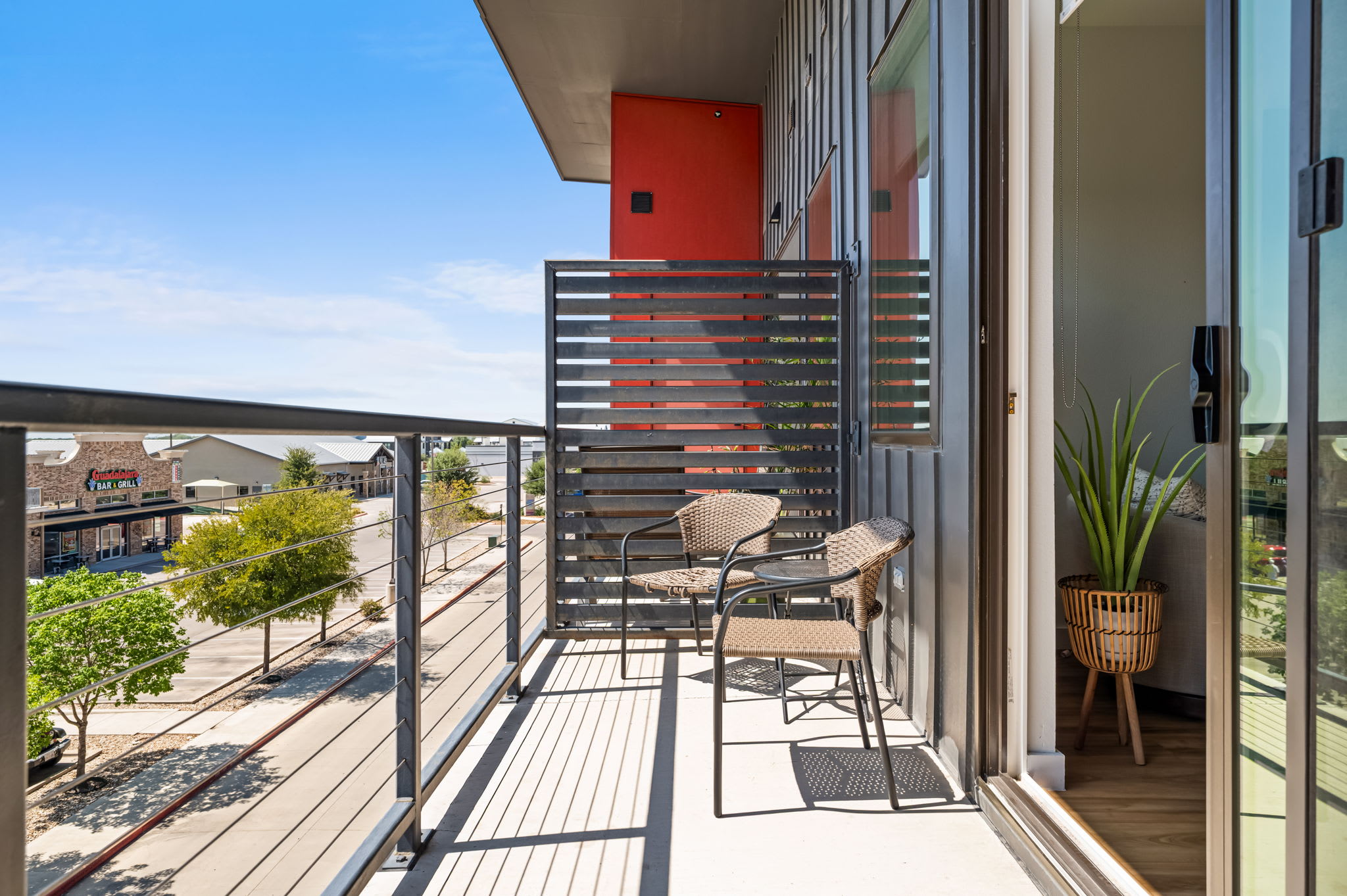 Private balcony with seating overlooking Freiheit Village
