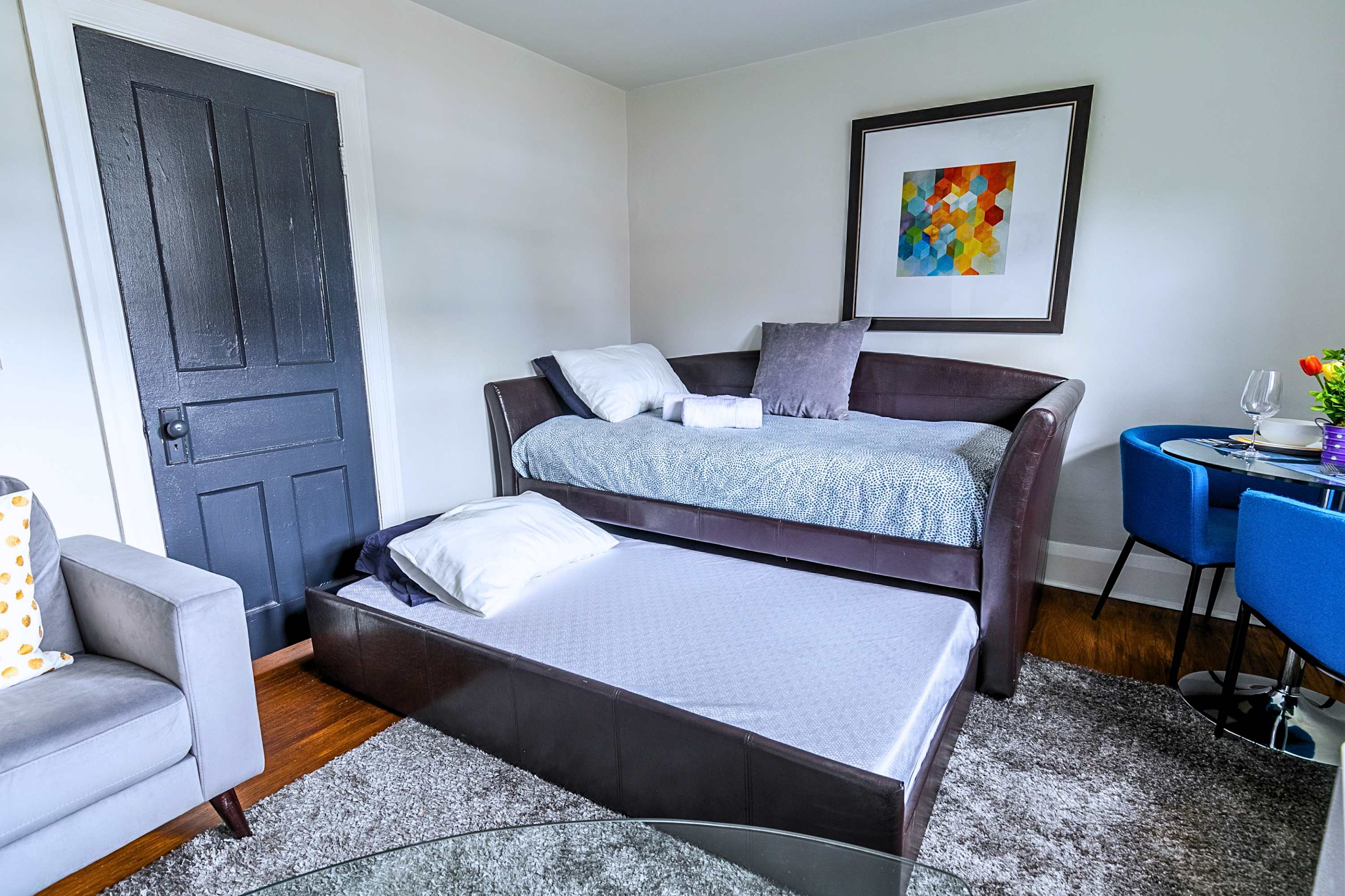 Versatile daybed featuring a convenient pull-out trundle bed, perfect for hosting extra guests.