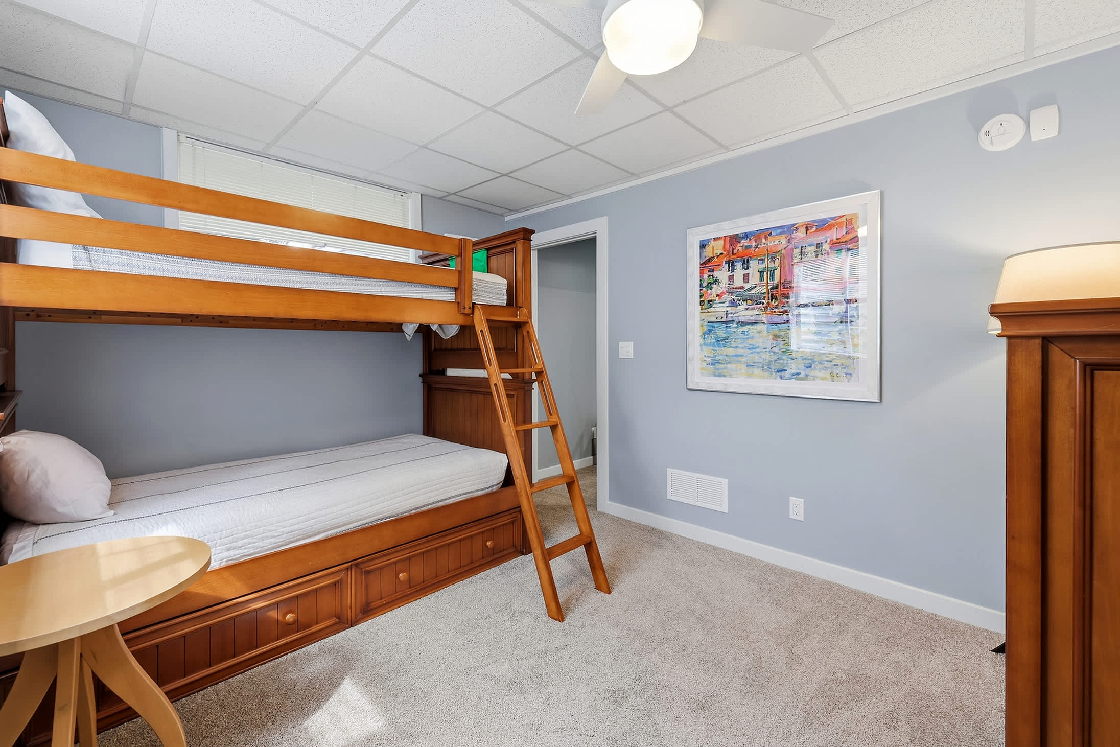 Bedroom 5 is on the main level & has a twin-size bunkbed.