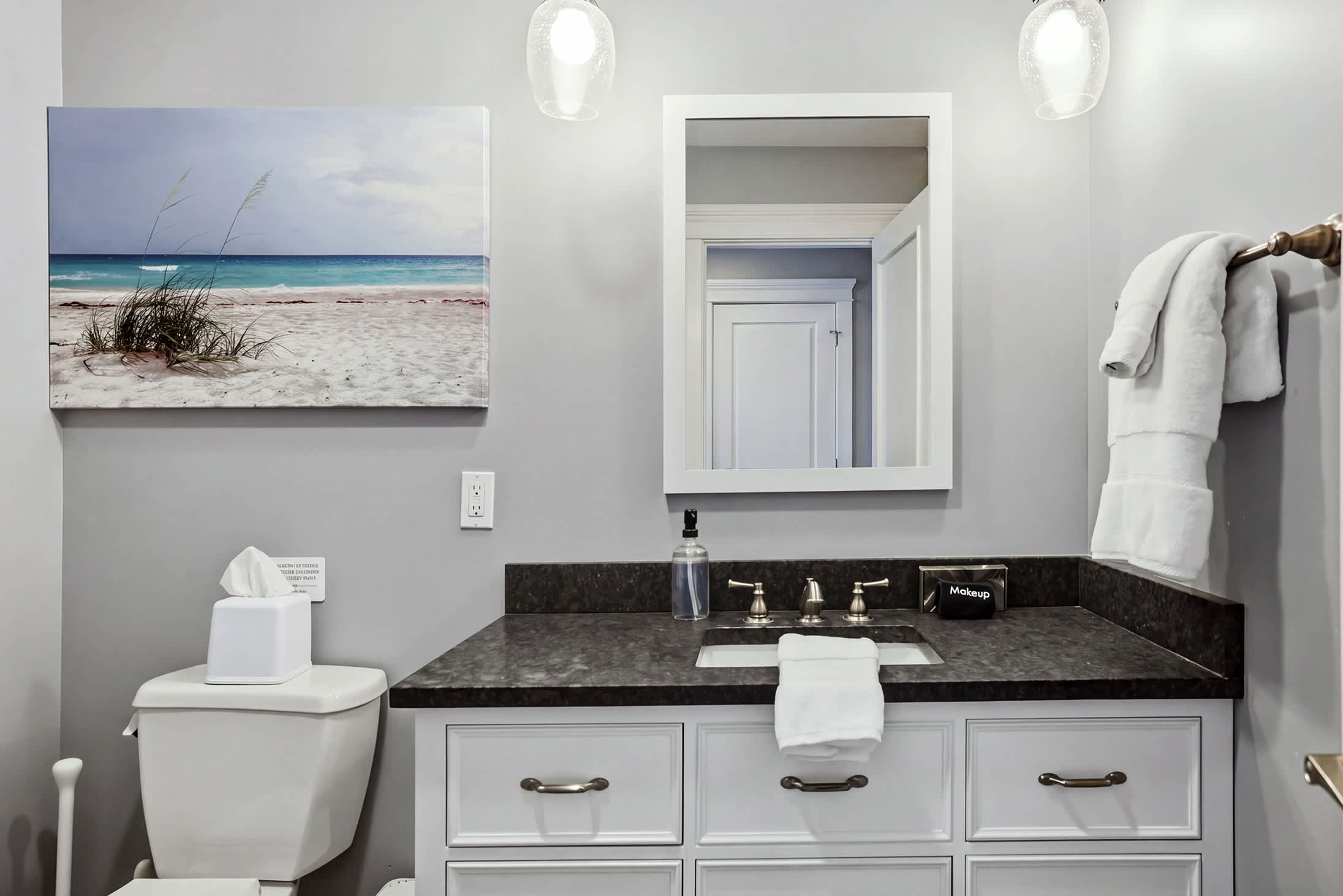 Enjoy privacy in this functional bathroom, equipped with all the essentials.