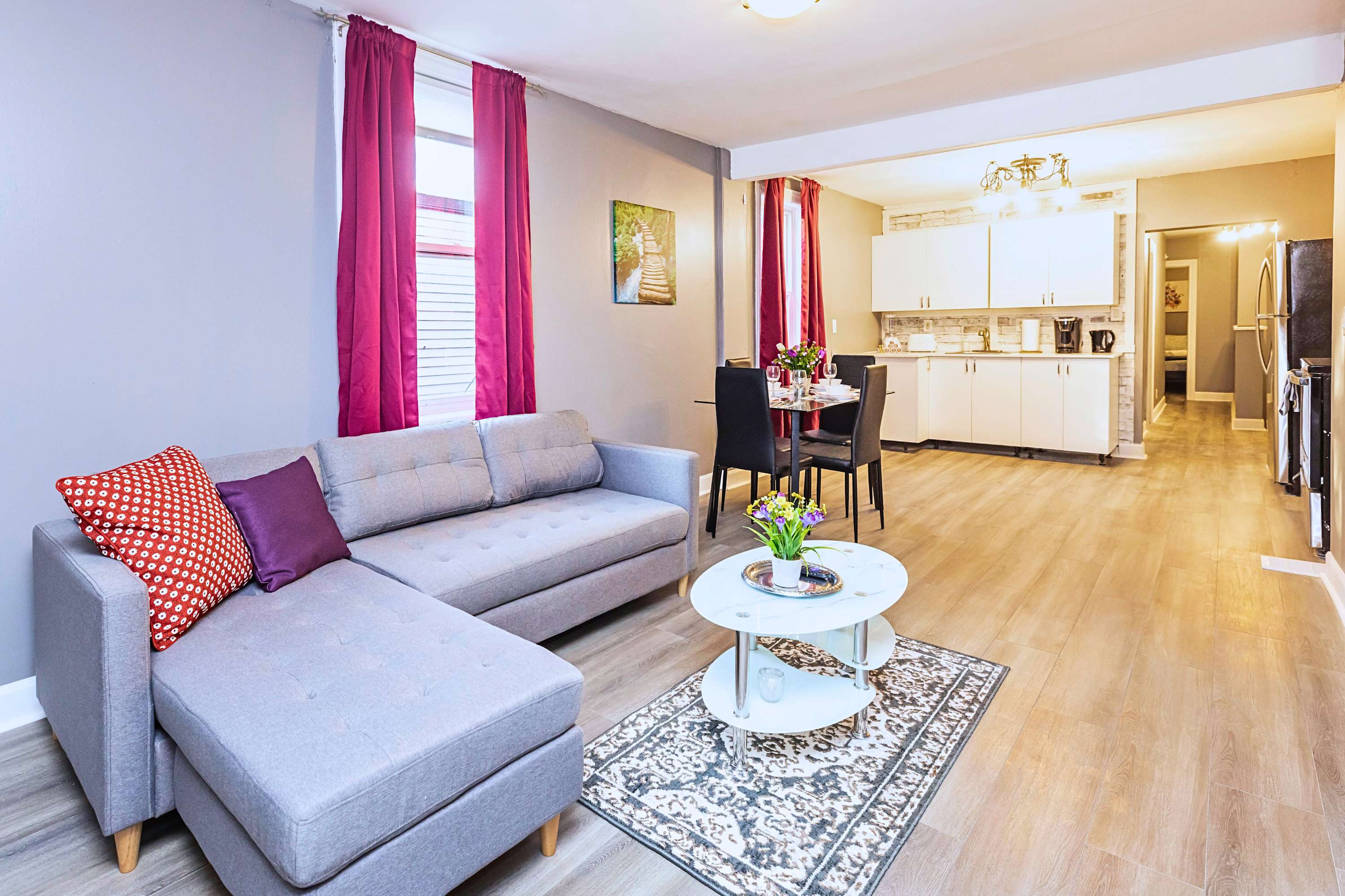 Seamless flow between cozy living and dining for four