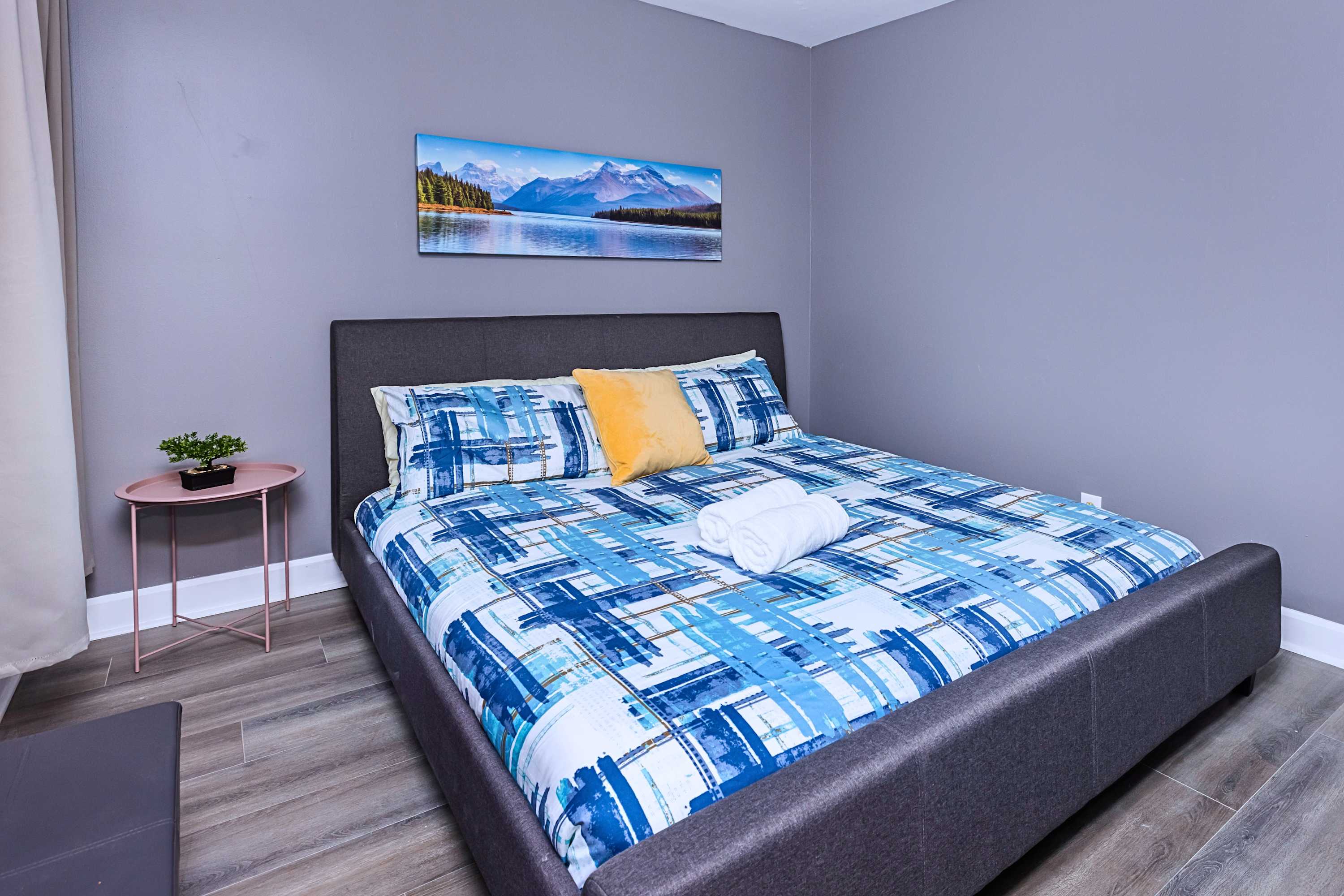 Restful bedroom setup featuring premium bedding and bedside table