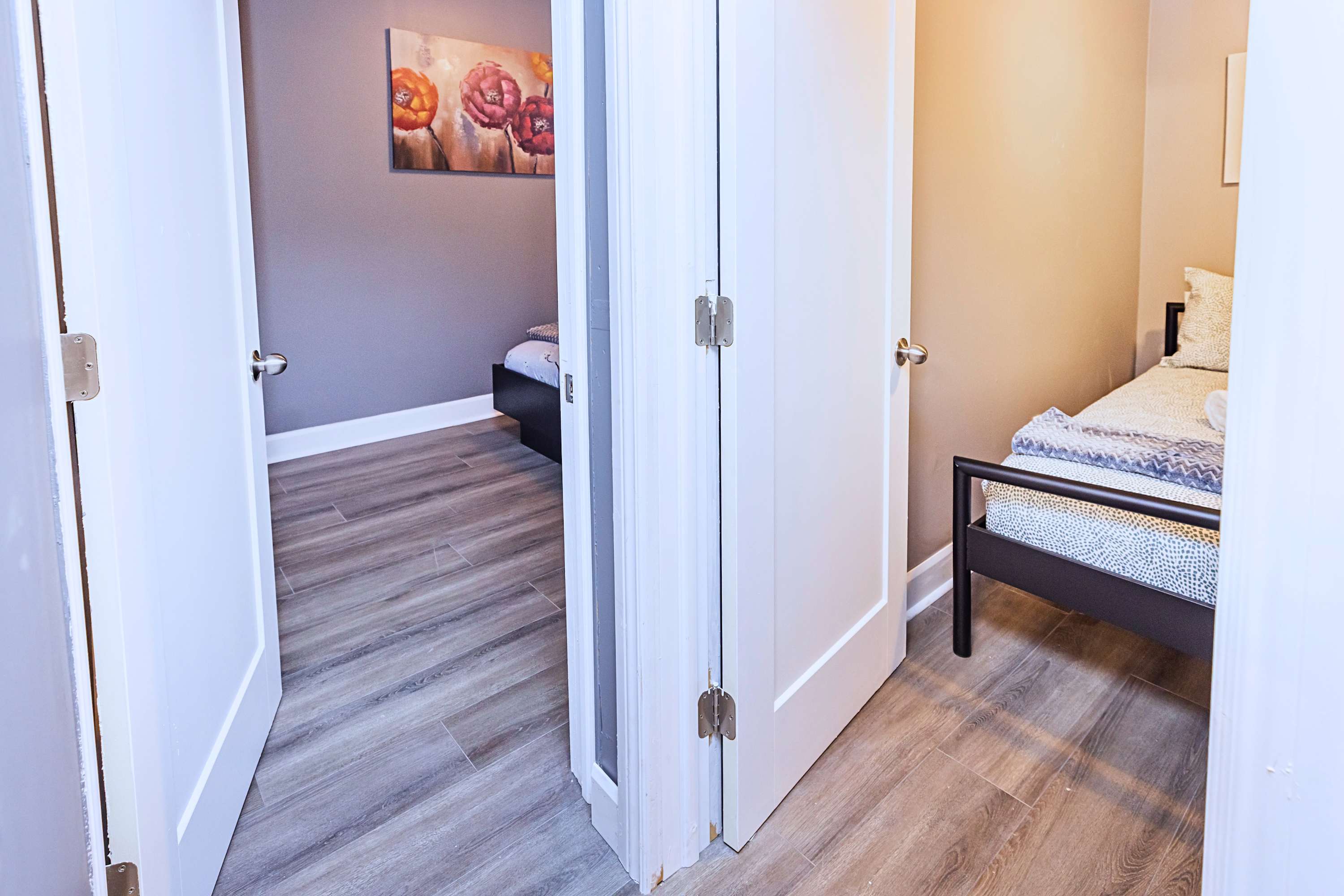 Two adjacent bedrooms offering cozy beds and privacy for all