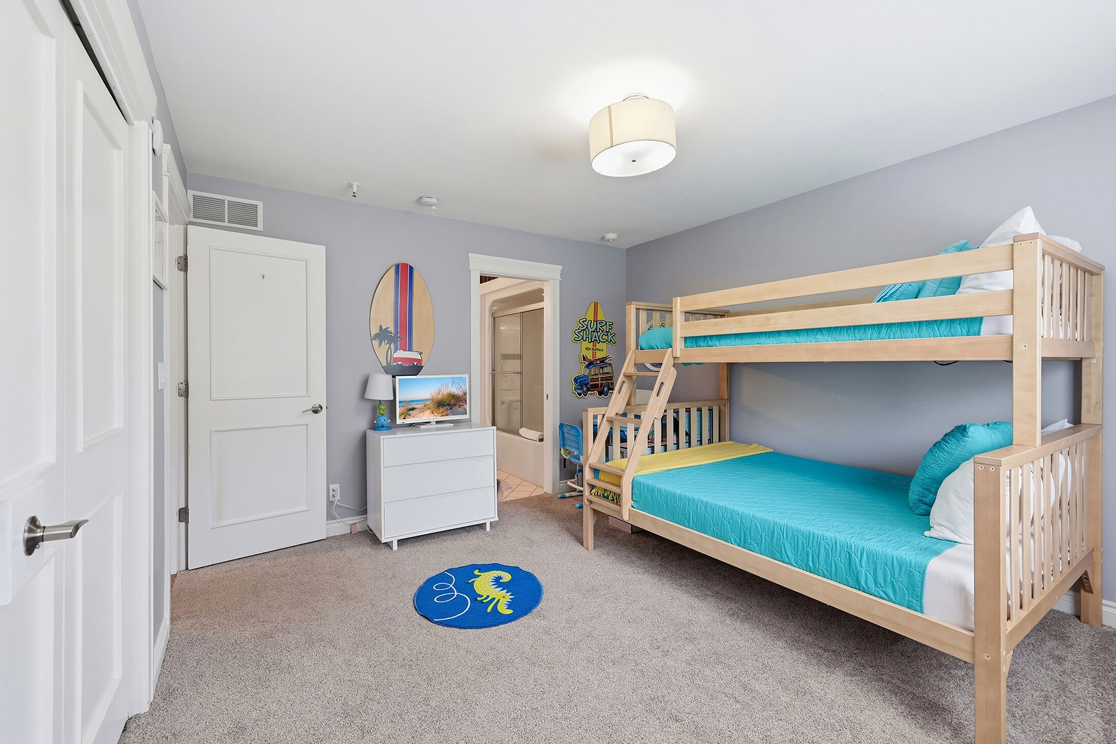 Bedroom 2 is on the main level & has a single-over-full bunkbed.