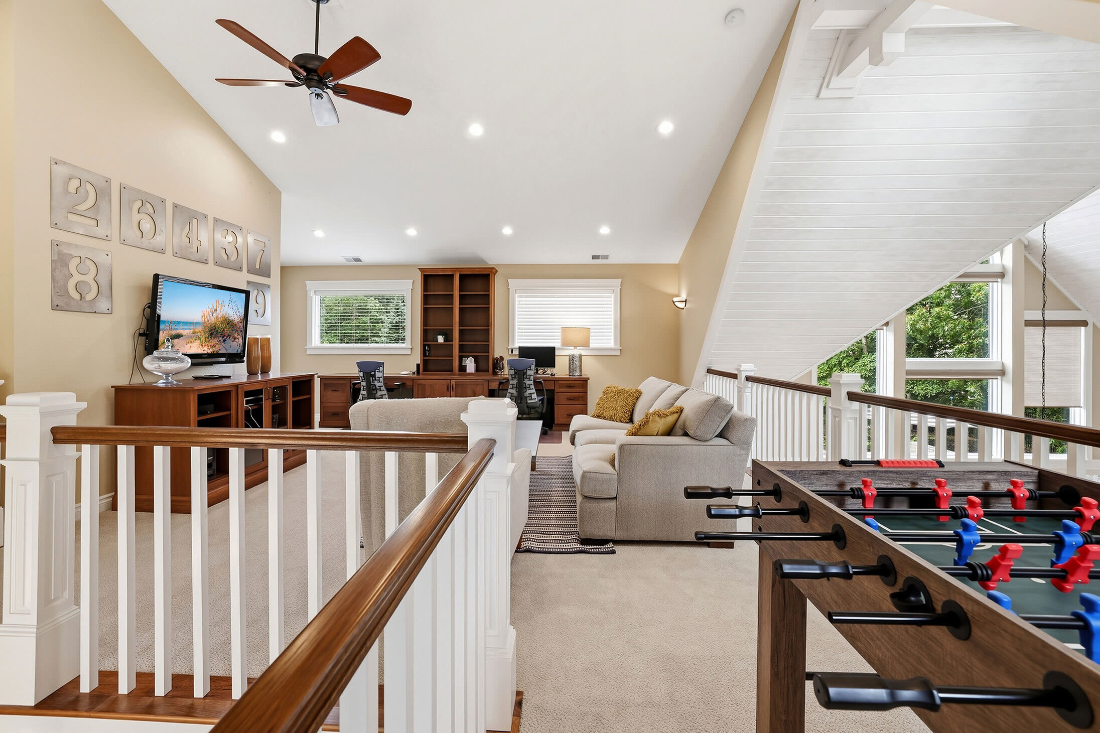 Upstairs sitting room with space to watch TV, play games, relax or work.