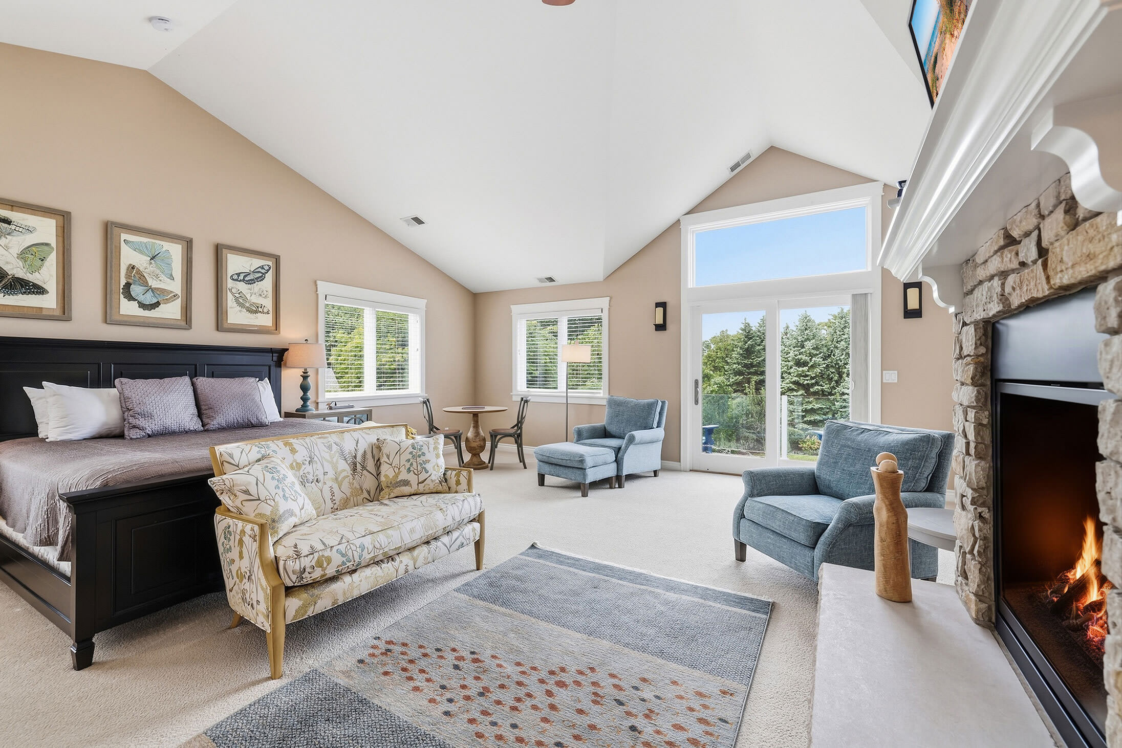 With a cozy fireplace and balcony, this space is the perfect escape from the stresses of daily life.