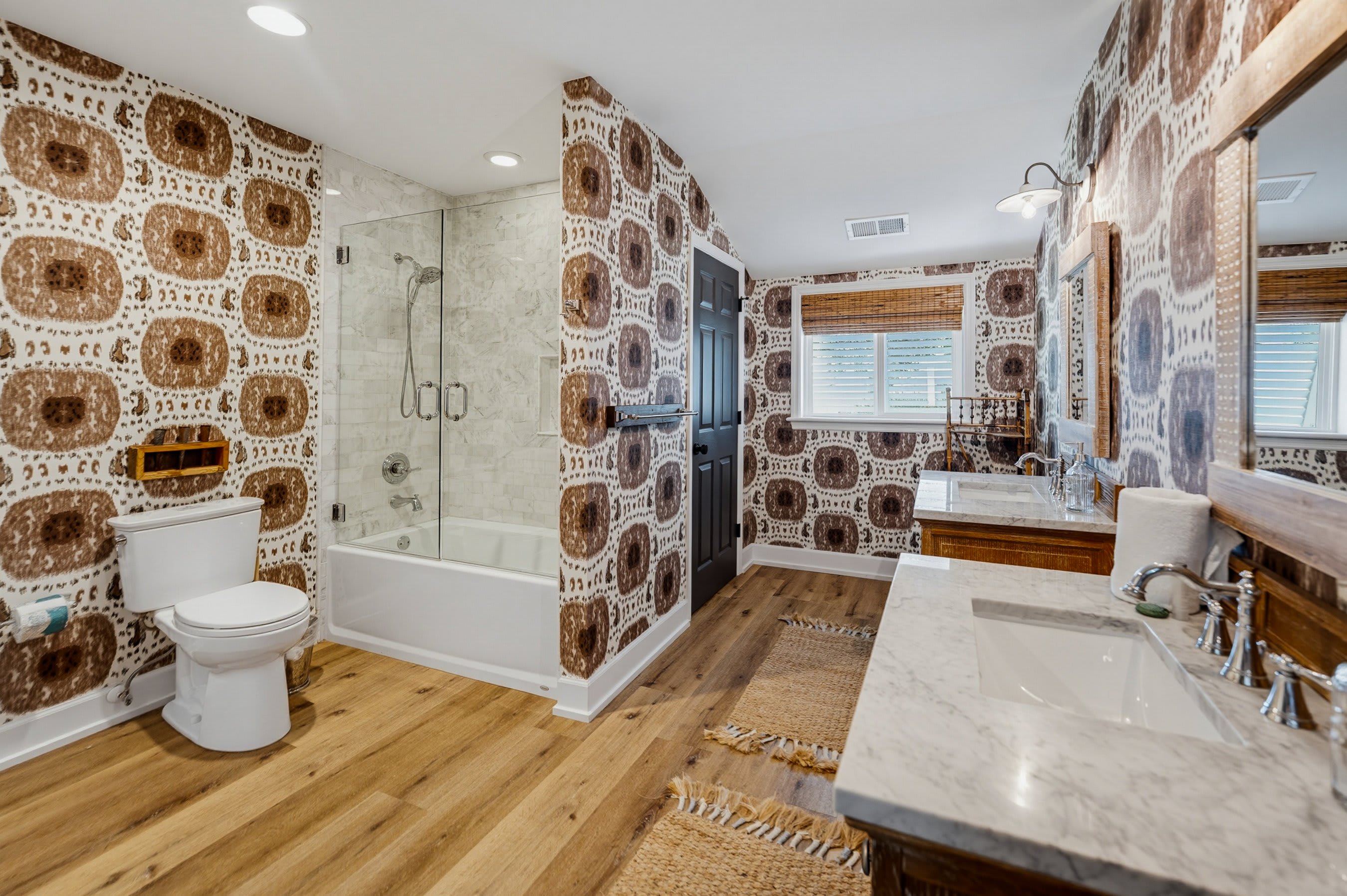 Shared Bathroom Upstairs with Tub Shower Combo and Laundry