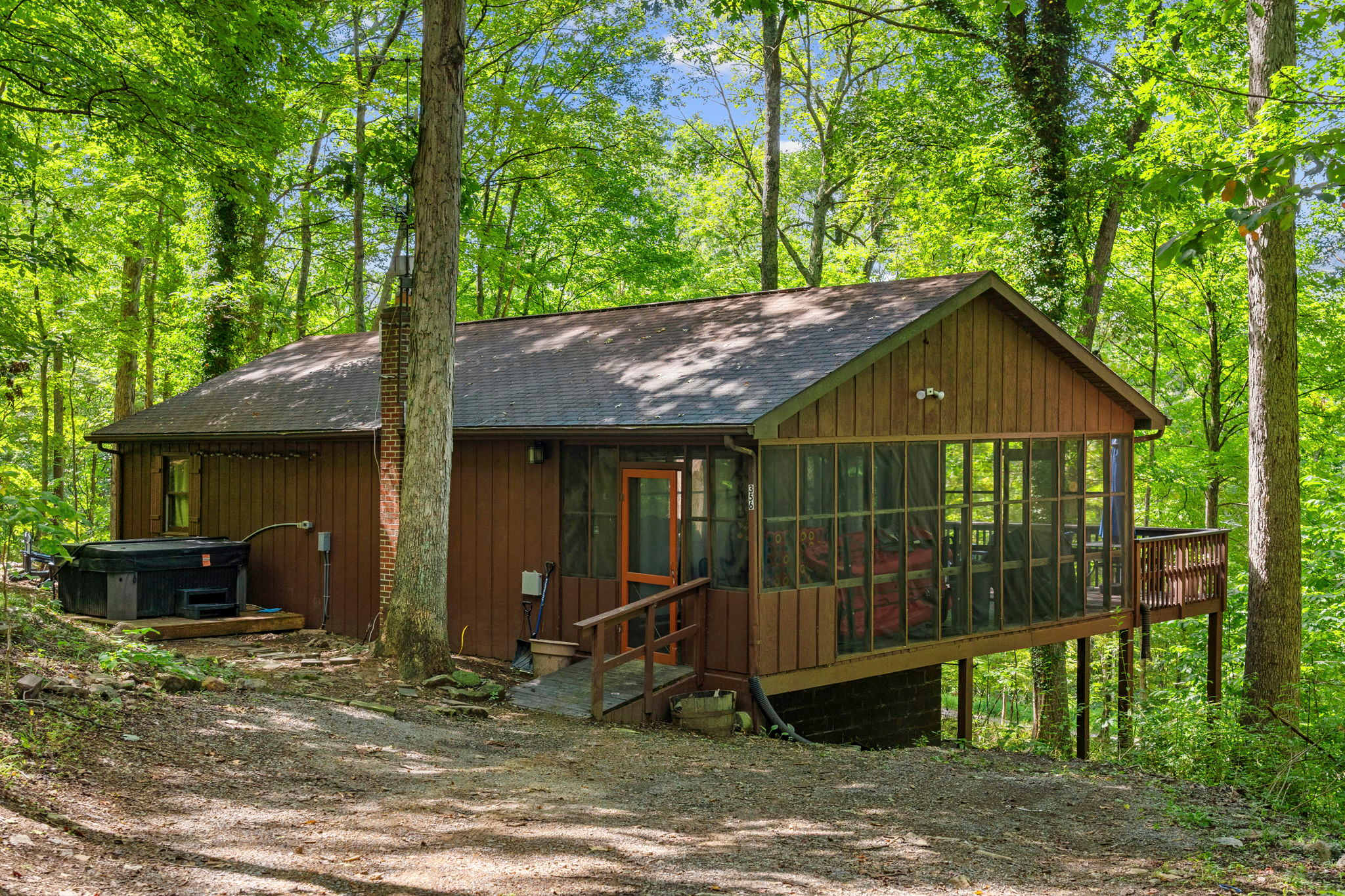 River Cabin w/ Hot Tub, Screened Porch & Fire Pit