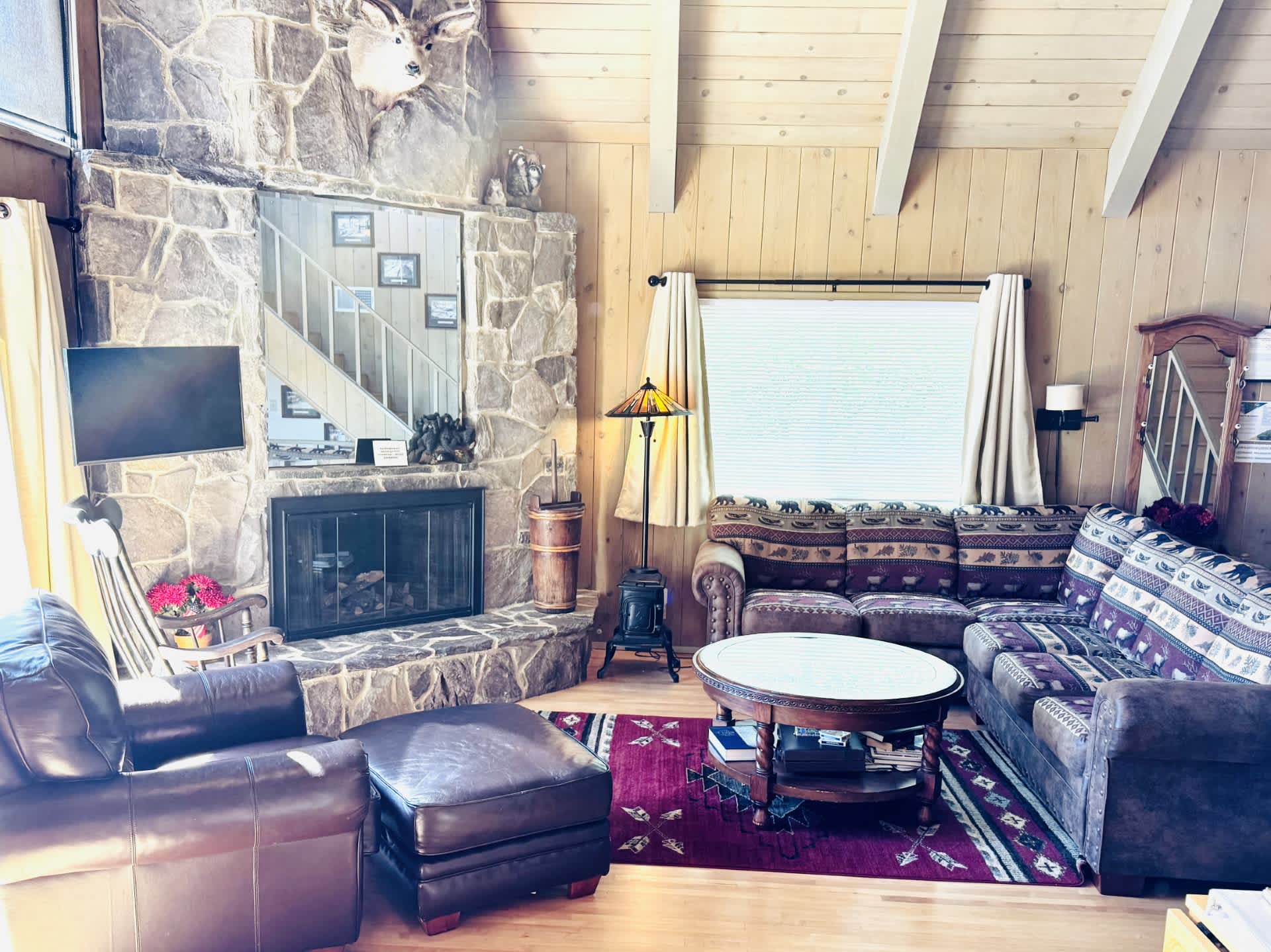 Curl up in the cozy living room sectional & stream your favorites on the smart TV.