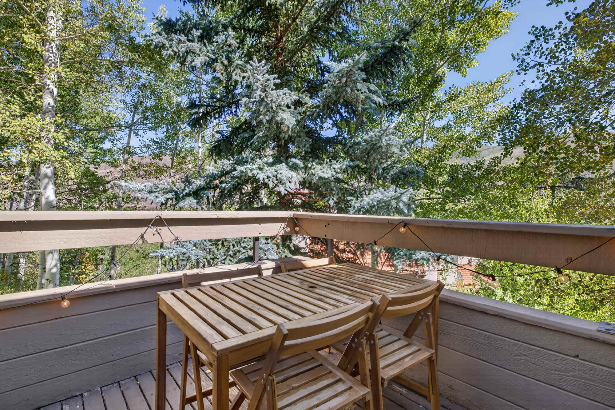Enjoy the fresh air with balcony seating for four and a BBQ.