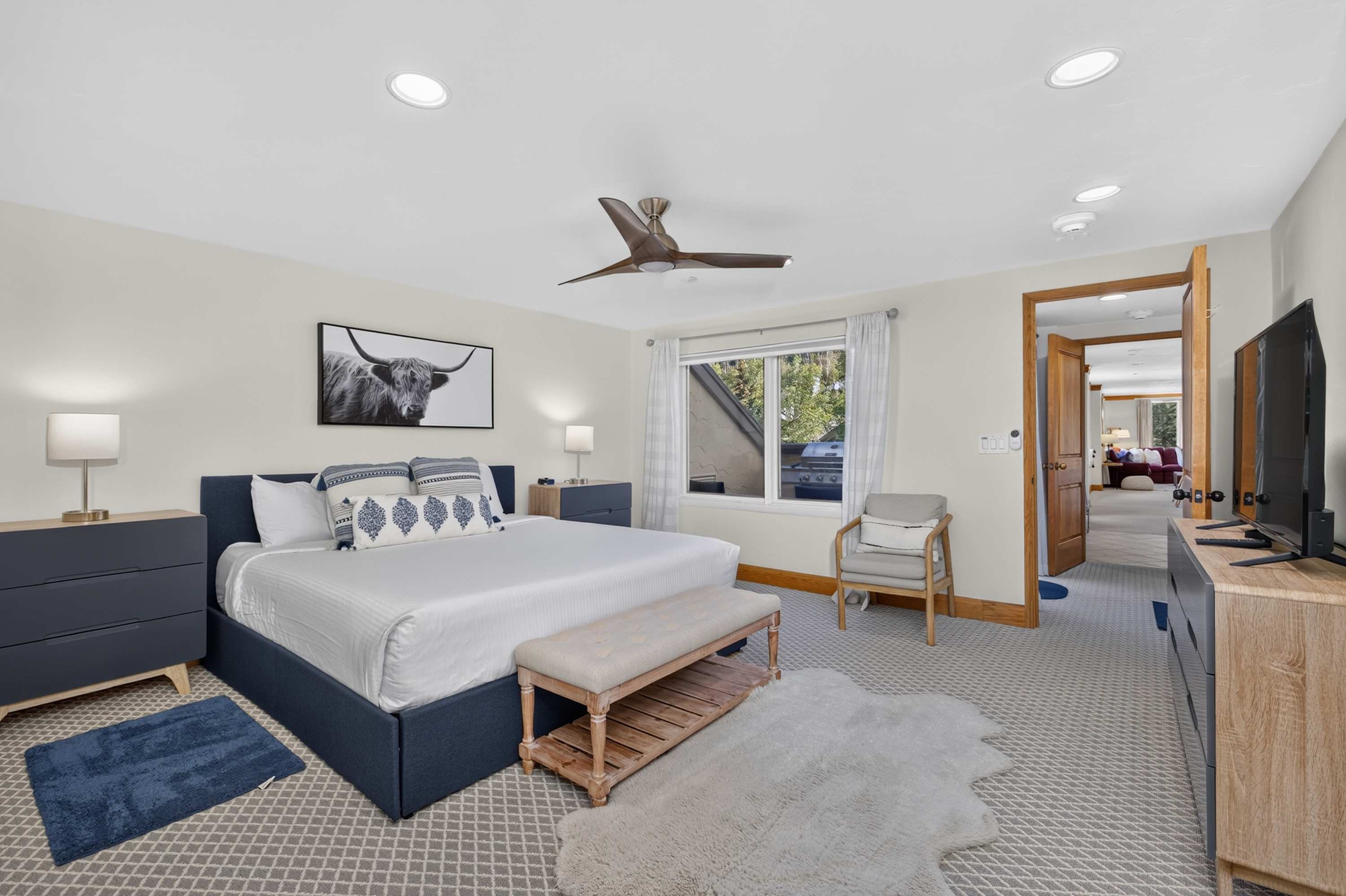 The primary king suite boasts a smart TV & private ensuite​
