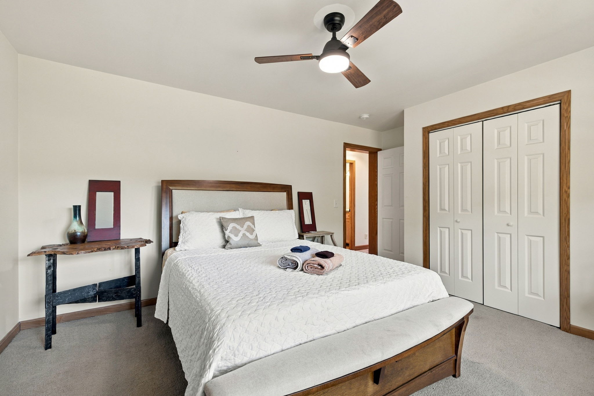 Bedroom 1 (Main Level): Queen bed and ceiling fan