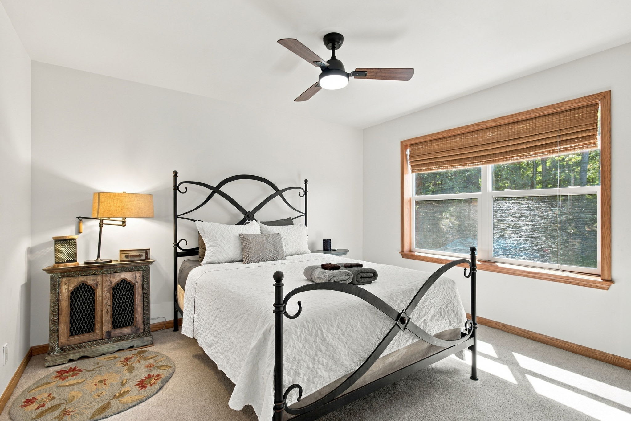 Bedroom 2 (Main Level): Queen bed and ceiling fan